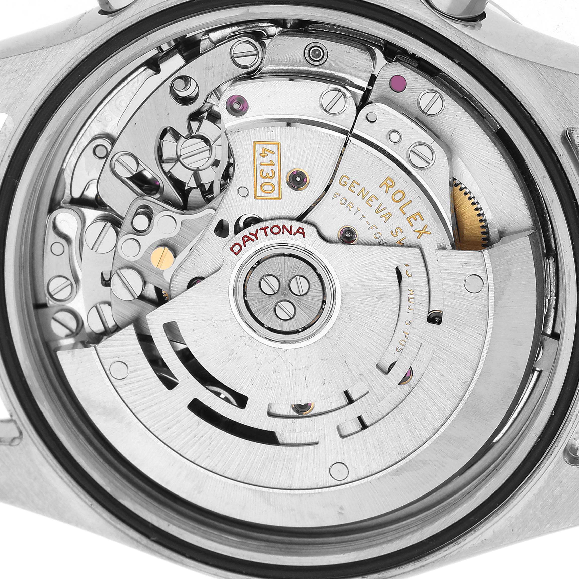 The image shows the Rolex Daytona 116520 Men's Stainless Steel White Dial watch's internal movement from a rear angle, highlighting its intricate mechanical components.