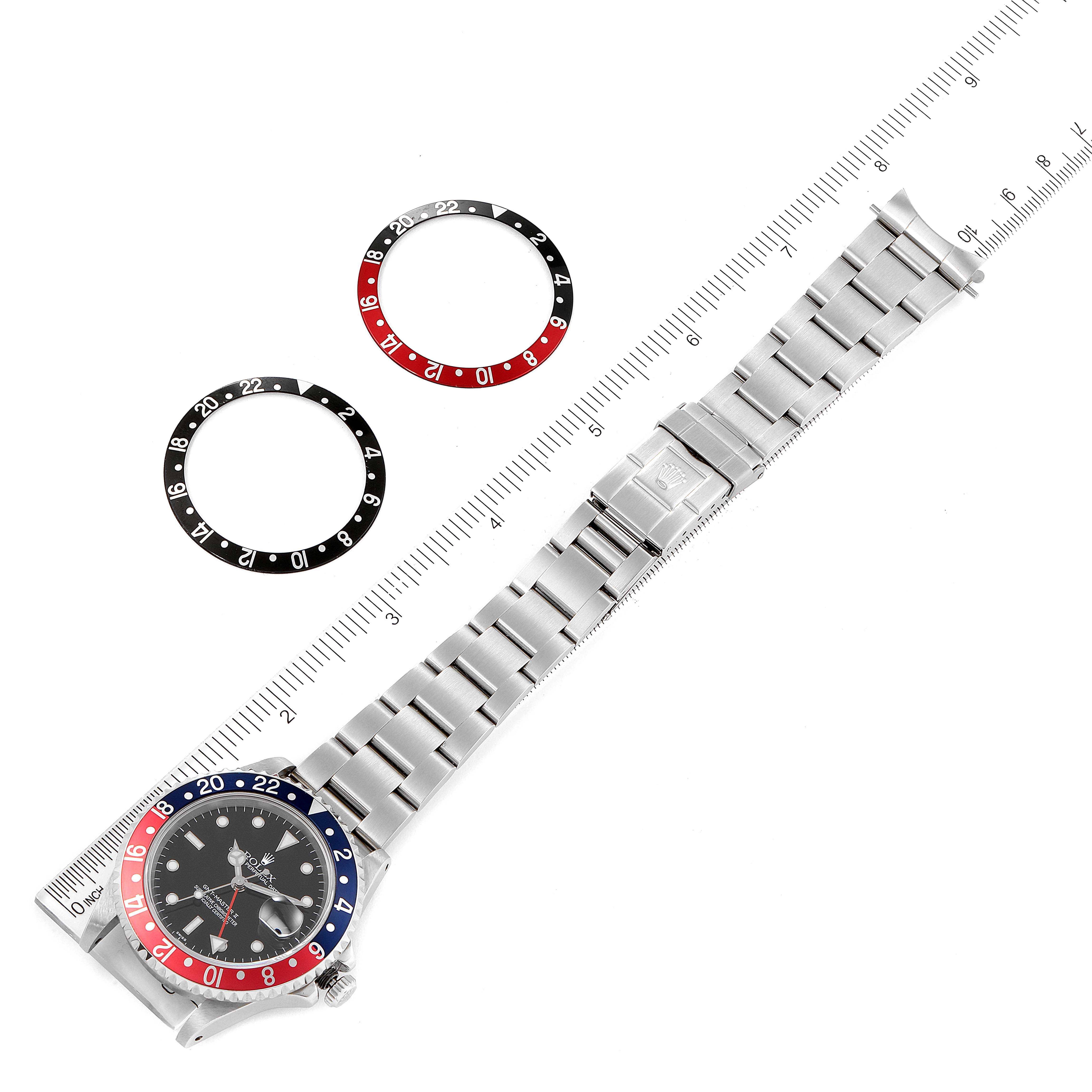 This Rolex GMT-Master 16710 Men's Stainless Steel Black Dial 16710 Men's Stainless Steel Black Dial watch is shown at a top-down angle, featuring the watch band and two additional bezels.