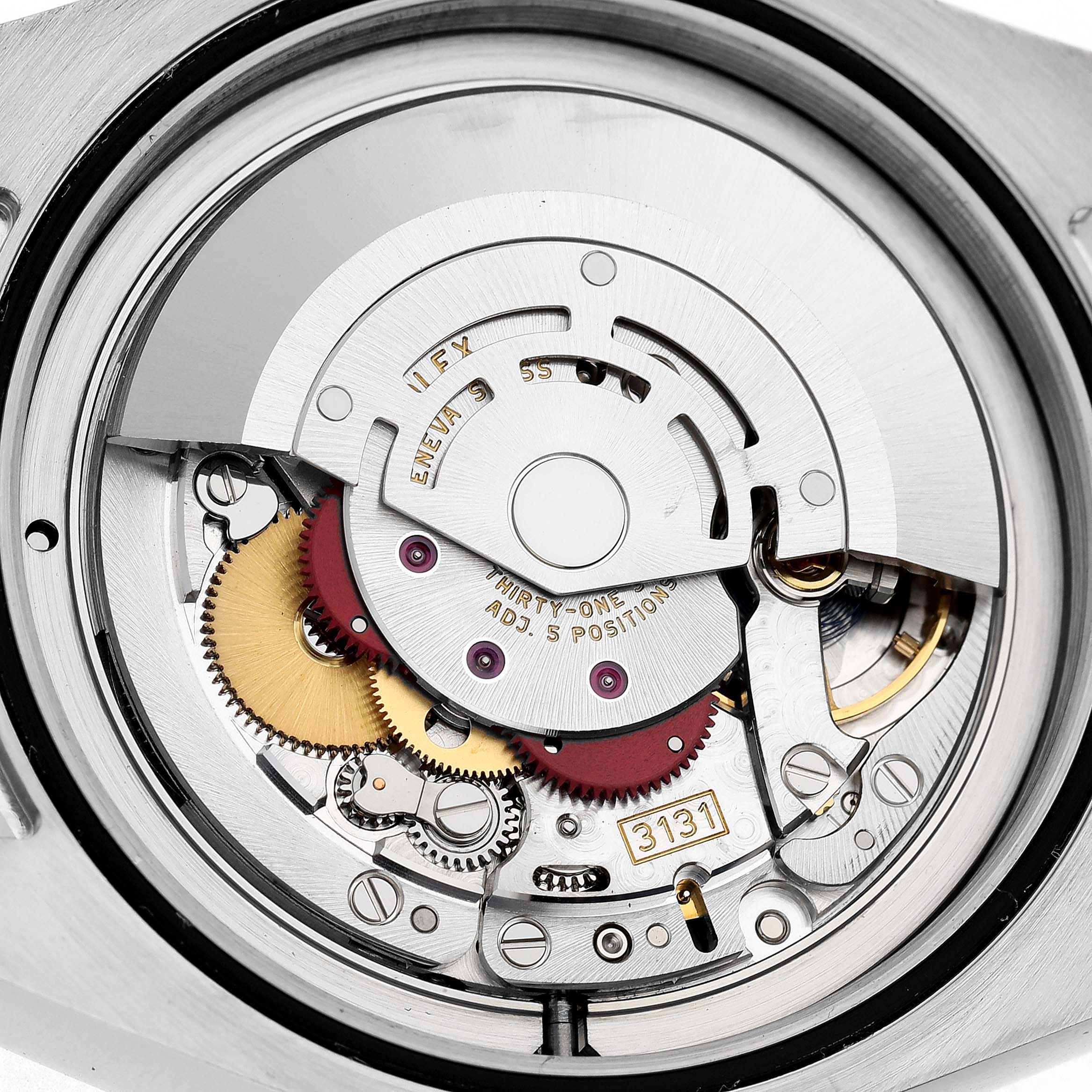The image shows the internal movement mechanism of a Rolex Milgauss M116400GV-0001 Men's Stainless Steel Black Dial watch viewed from the back.
