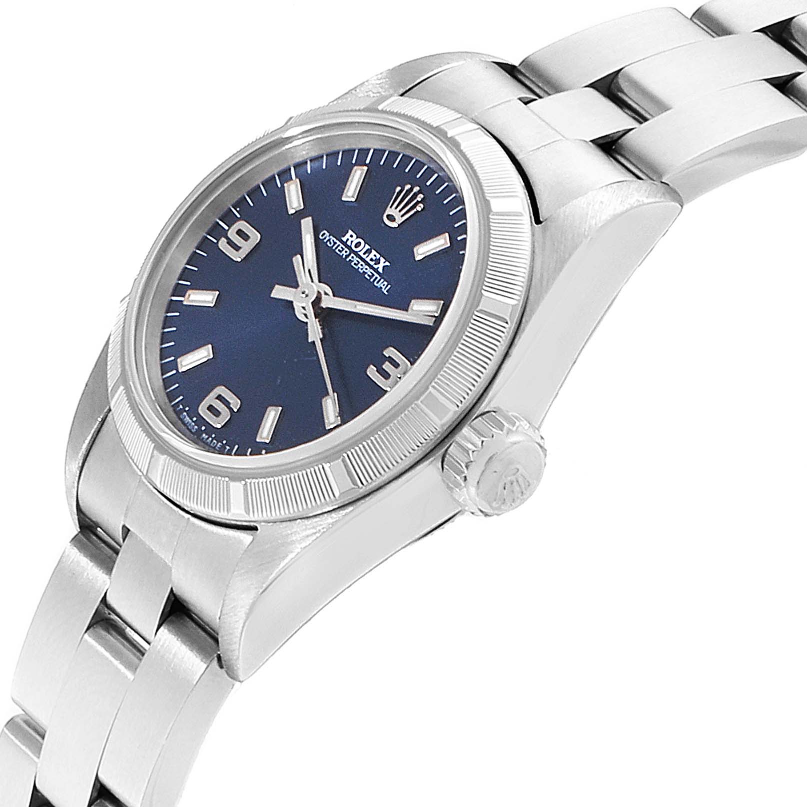 The image shows a side and partial front angle of the Rolex Oyster Perpetual 67230 Women
s Stainless Steel Blue Dial 67230 Women
s Stainless Steel Blue Dial watch, highlighting the bezel, crown, and bracelet.
