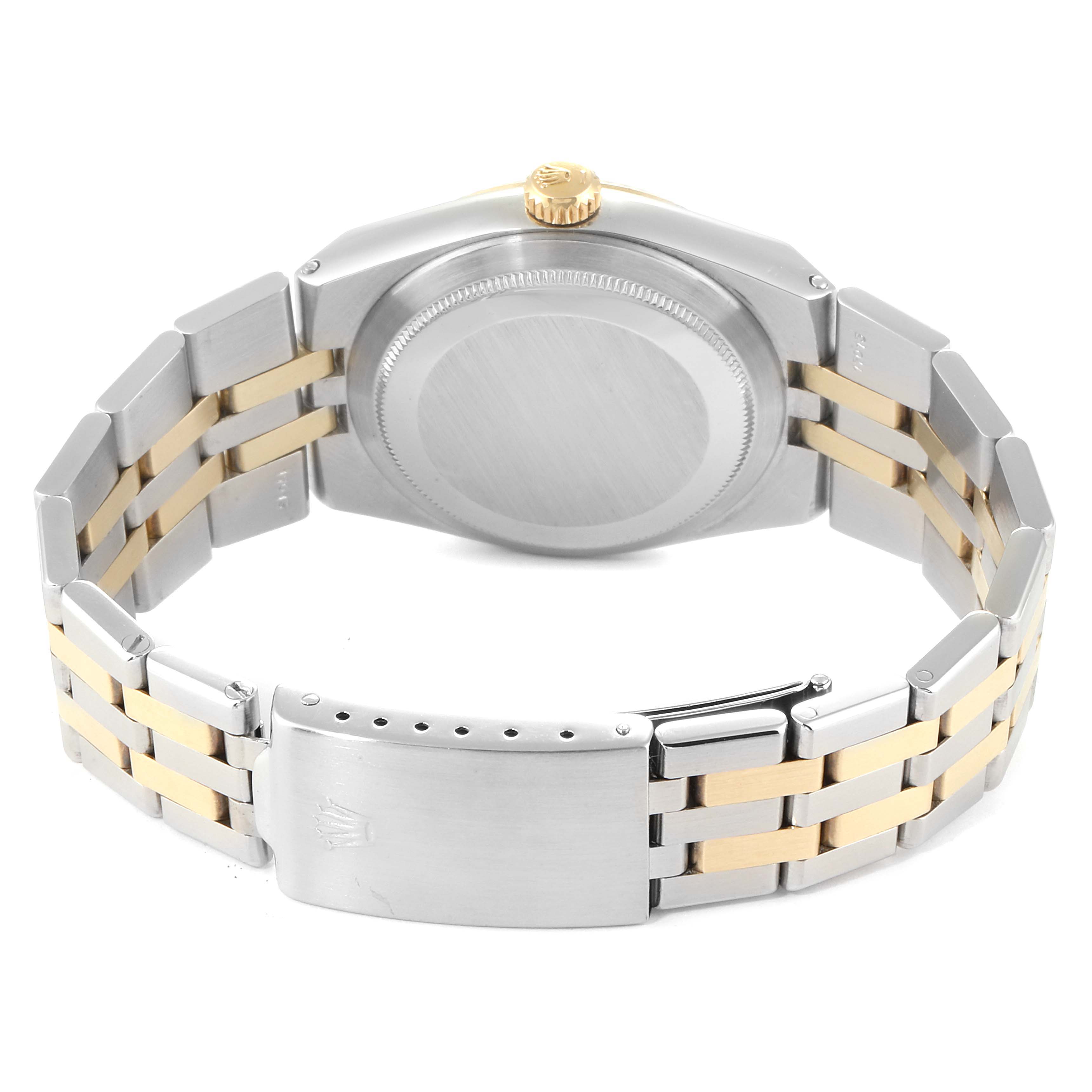 The image shows the back view of a Rolex Oysterquartz 17013 Men's Steel and Gold (two tone) Silver Dial 17013 Men's Steel and Gold (two tone) Silver Dial watch, highlighting the case back and two-tone bracelet.