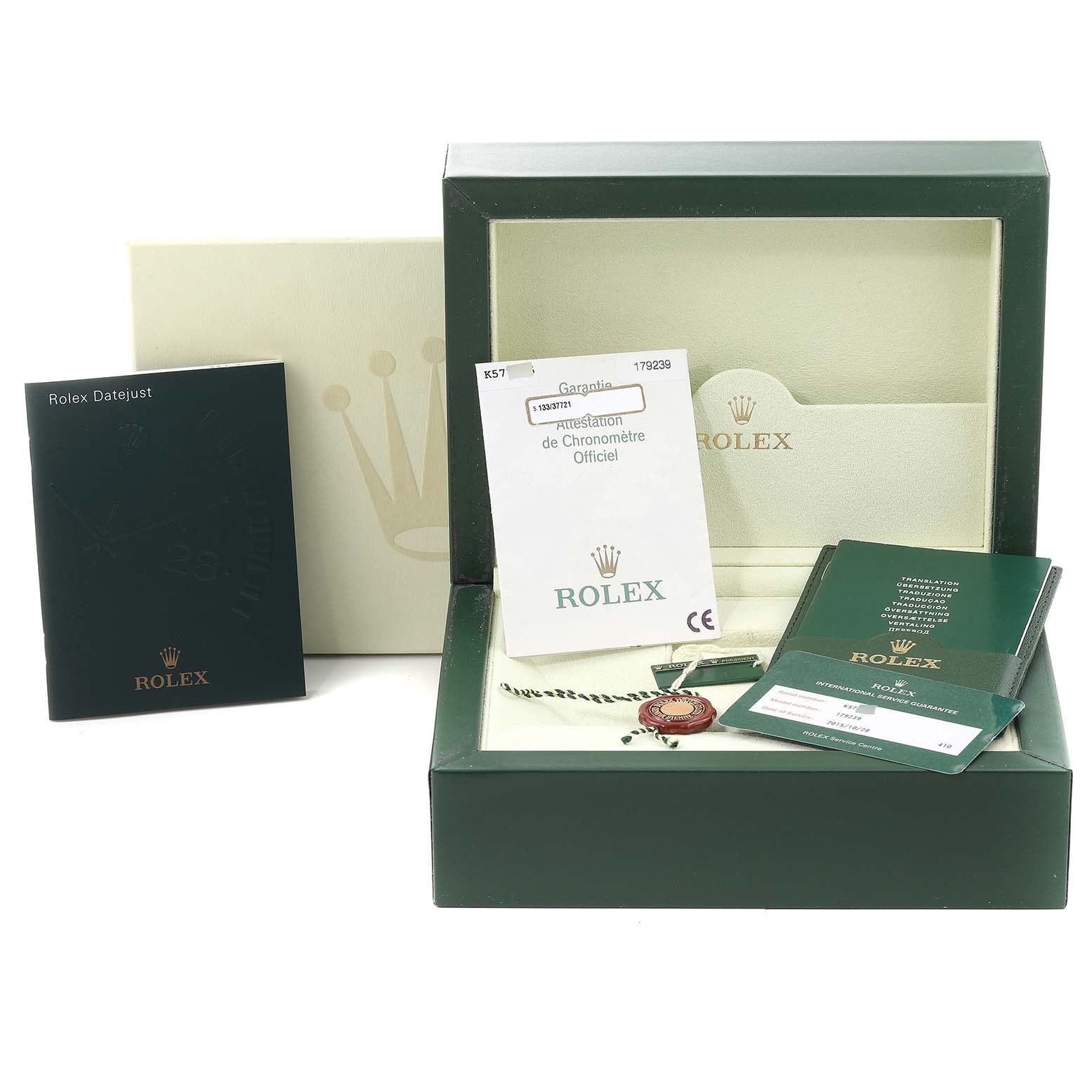 The image shows an opened Rolex President 179239 Women's White Gold Mother of Pearl Dial 179239 Women's White Gold Mother of Pearl Dial model watch box with various booklets and certificates.