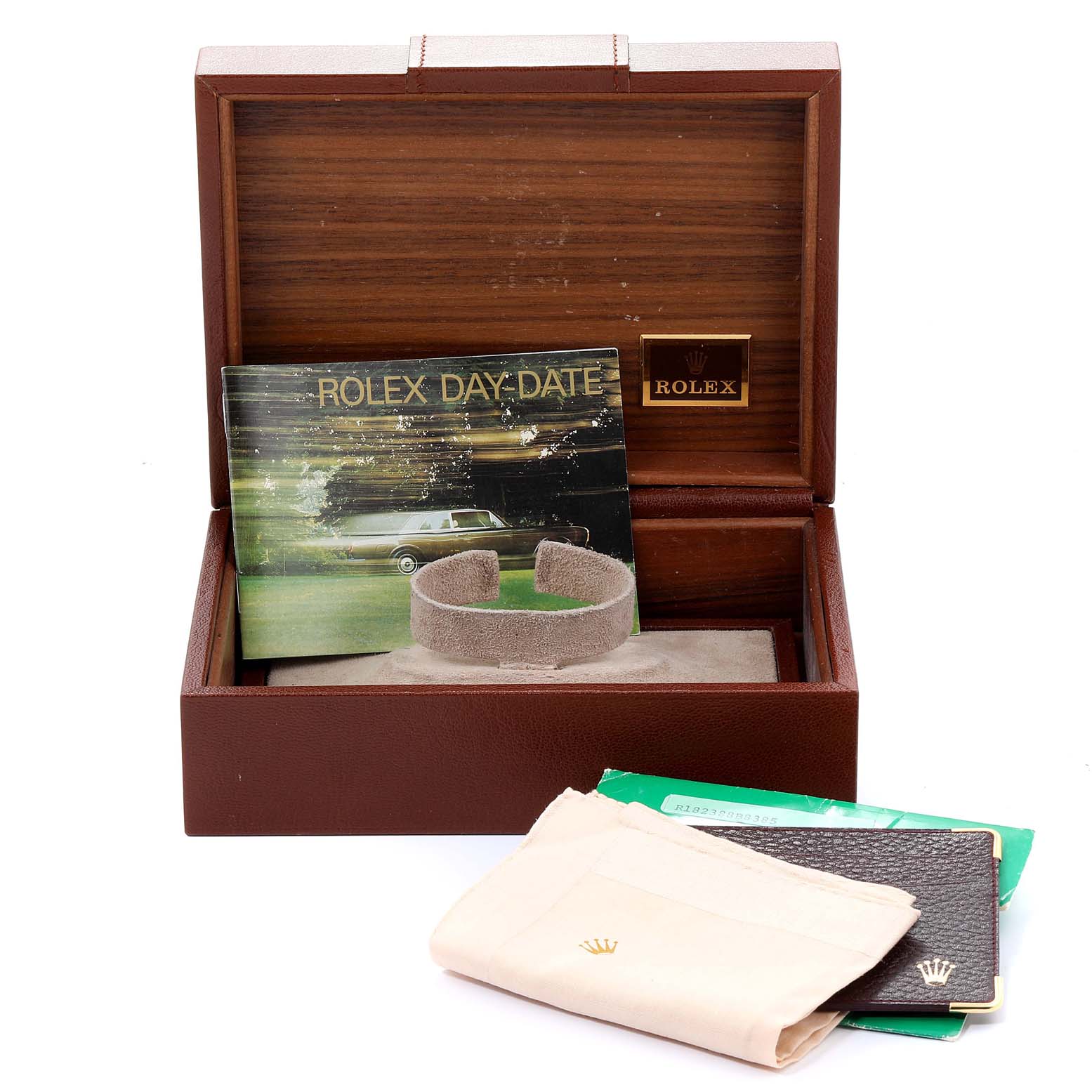 The image shows a Rolex President 18038 Men's Yellow Gold Champagne Dial 18038 Men's Yellow Gold Champagne Dial model watch box, booklets, a cushion, and polishing cloth from a front angle.
