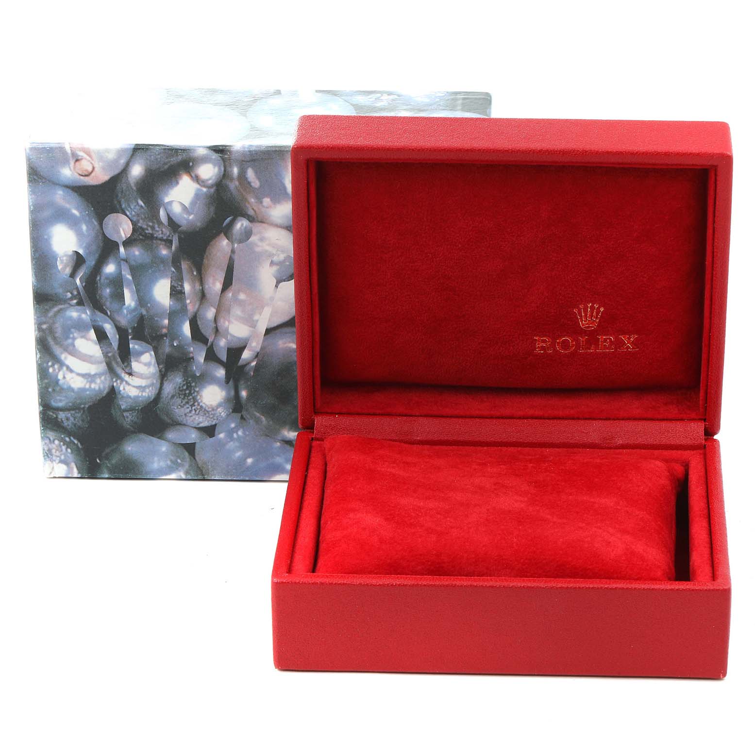 This image shows an open red Rolex box for the President model with a closed outer sleeve featuring a decorative pattern.