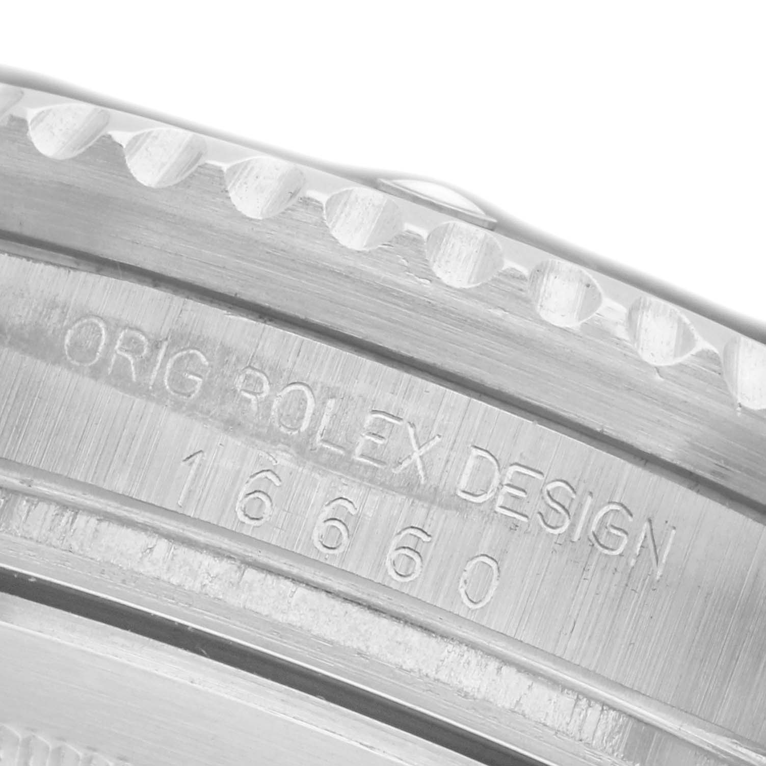 The close-up image shows the side engraving of the Rolex Sea-Dweller 16660 Men
s Stainless Steel Black Dial 16660 Men
s Stainless Steel Black Dial case, featuring the model number.