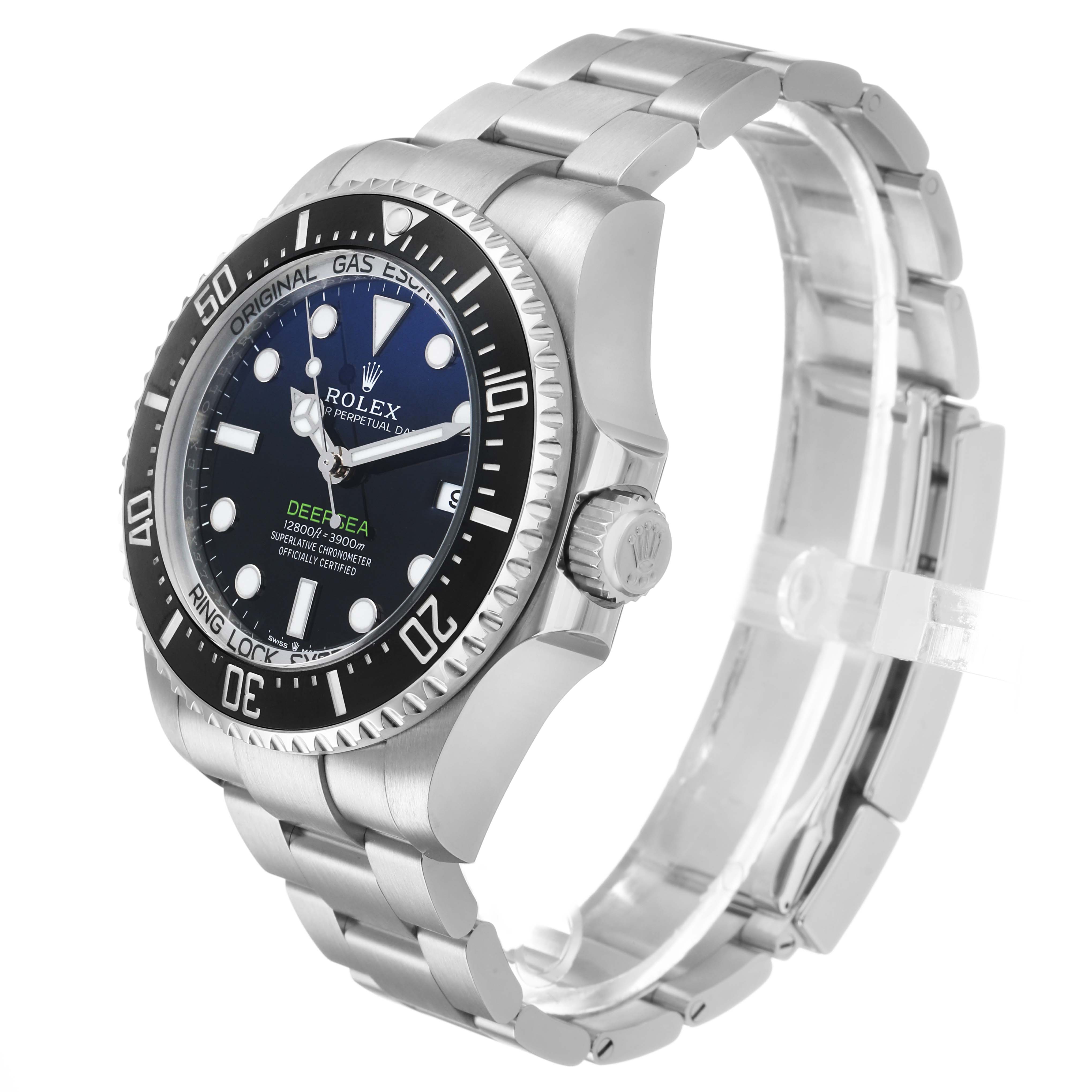 The Rolex Sea-Dweller 136660 Men's Stainless Steel Blue Dial watch is shown at a three-quarter angle, displaying the face, bezel, crown, and metal bracelet.
