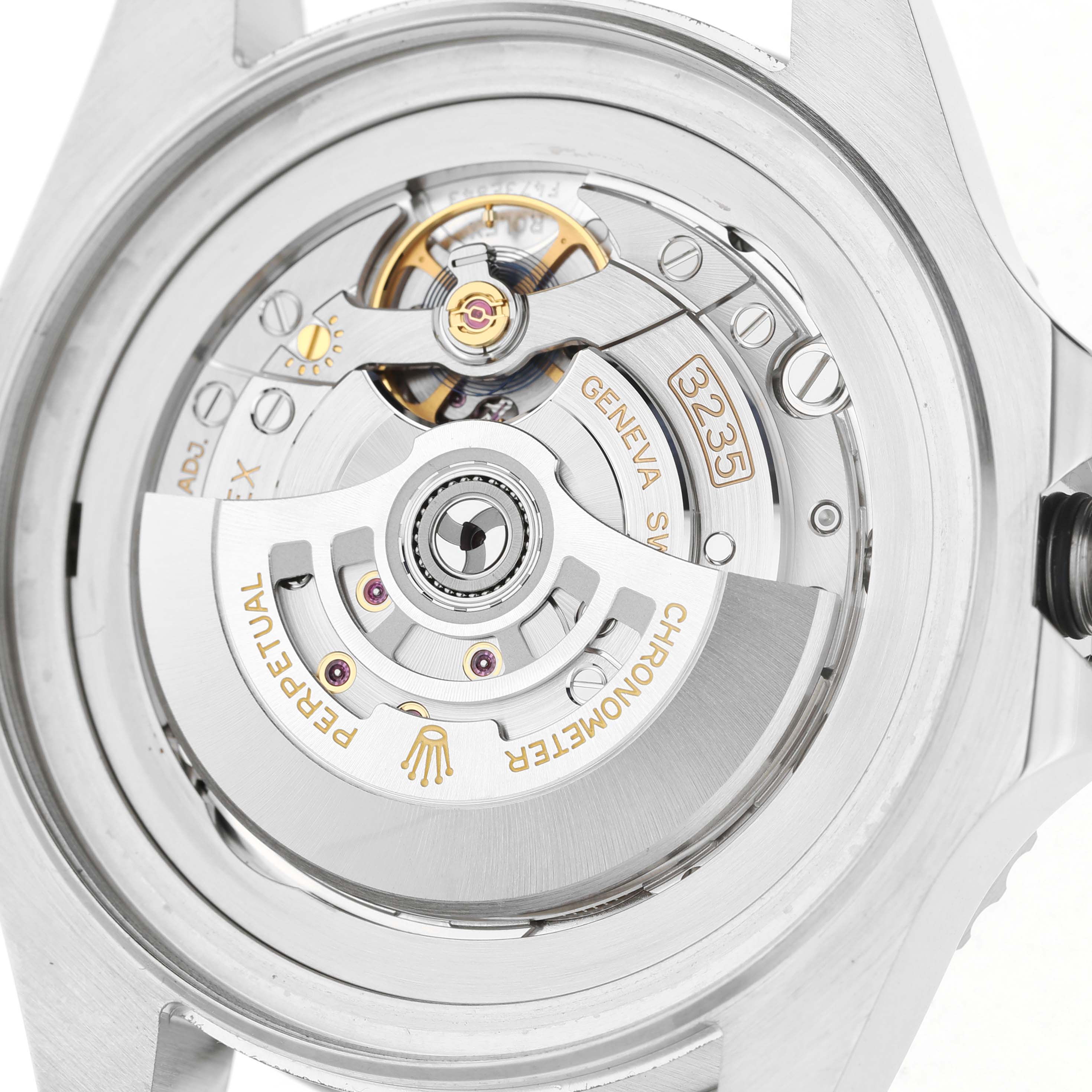The image shows the open case back of a Rolex Sea-Dweller 136660 Men's Stainless Steel Blue Dial, highlighting its intricate movement and rotor.