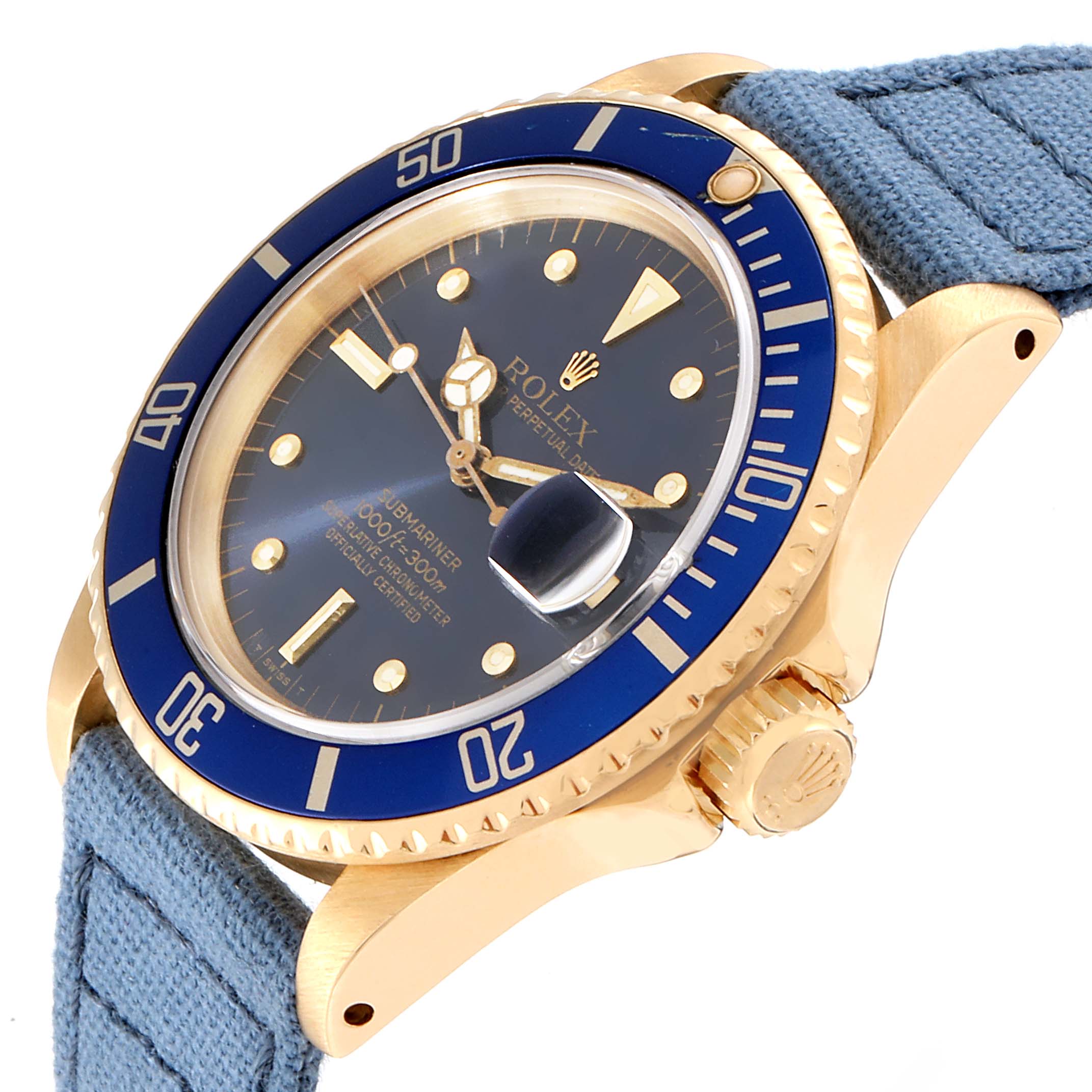 The image shows a close-up angled view of a Rolex Submariner 16808 Men
s Yellow Gold Blue Dial 16808 Men
s Yellow Gold Blue Dial, highlighting the bezel, face, crown, and portion of the strap.