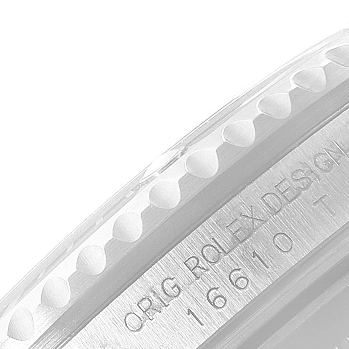 This close-up photo shows the bezel and part of the case side engraving of the Rolex Submariner 16610 Men
s Stainless Steel Black Dial 16610 Men
s Stainless Steel Black Dial model 16610 T.
