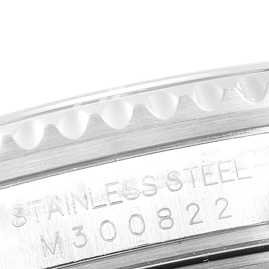 This close-up image shows the side view of the stainless steel bezel and part of the case for the Rolex Submariner 16610 Men
s Stainless Steel Black Dial 16610 Men
s Stainless Steel Black Dial watch.