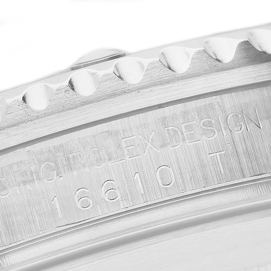 The image shows a close-up of the engraving on the case side of a Rolex Submariner 16610 Men's Stainless Steel Black Dial, displaying the model number.