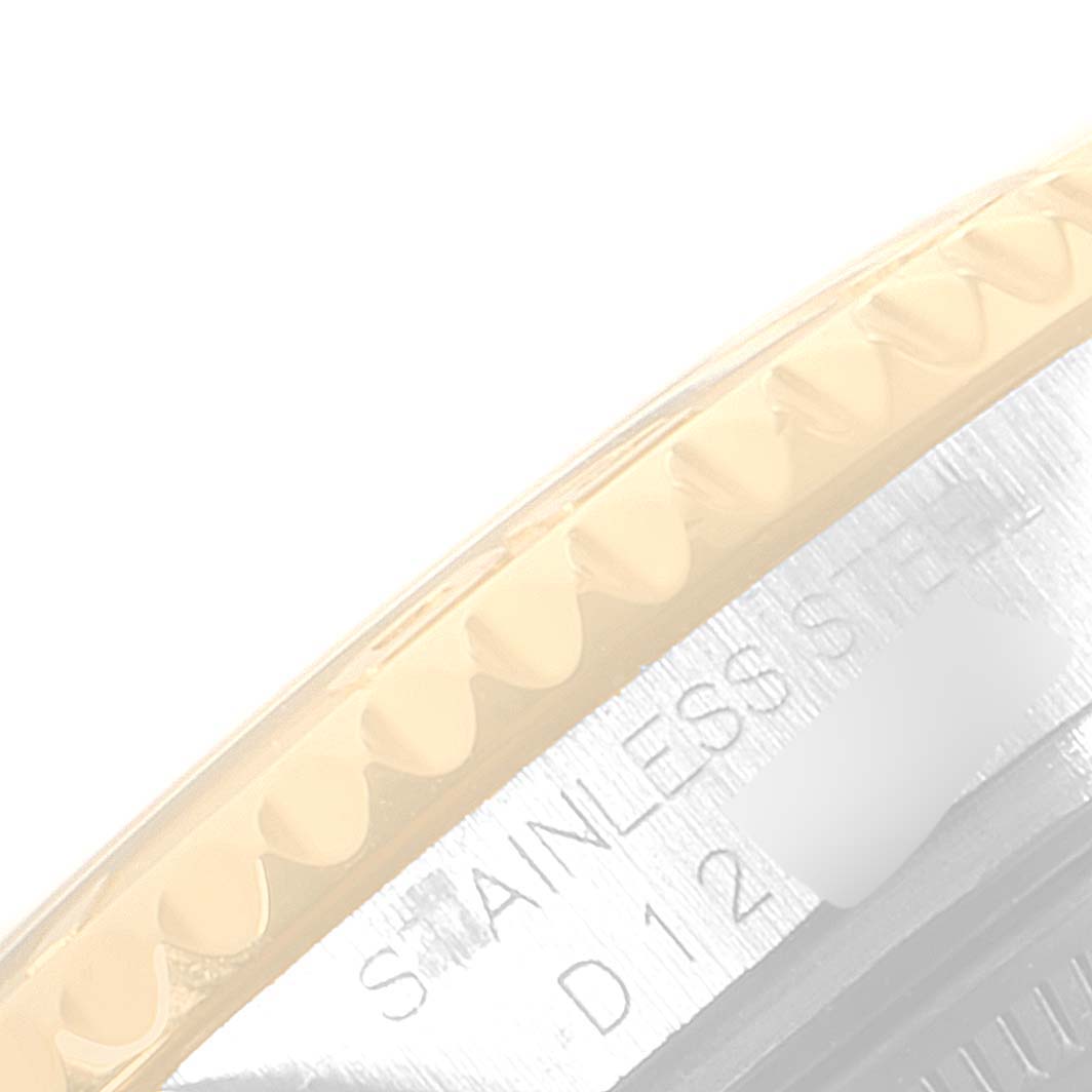 This close-up image shows the side view of the case back and part of the bezel of the Rolex Yacht-Master 168623 Men
s Steel and Gold (two tone) Grey Dial 168623 Men
s Steel and Gold (two tone) Grey Dial watch.