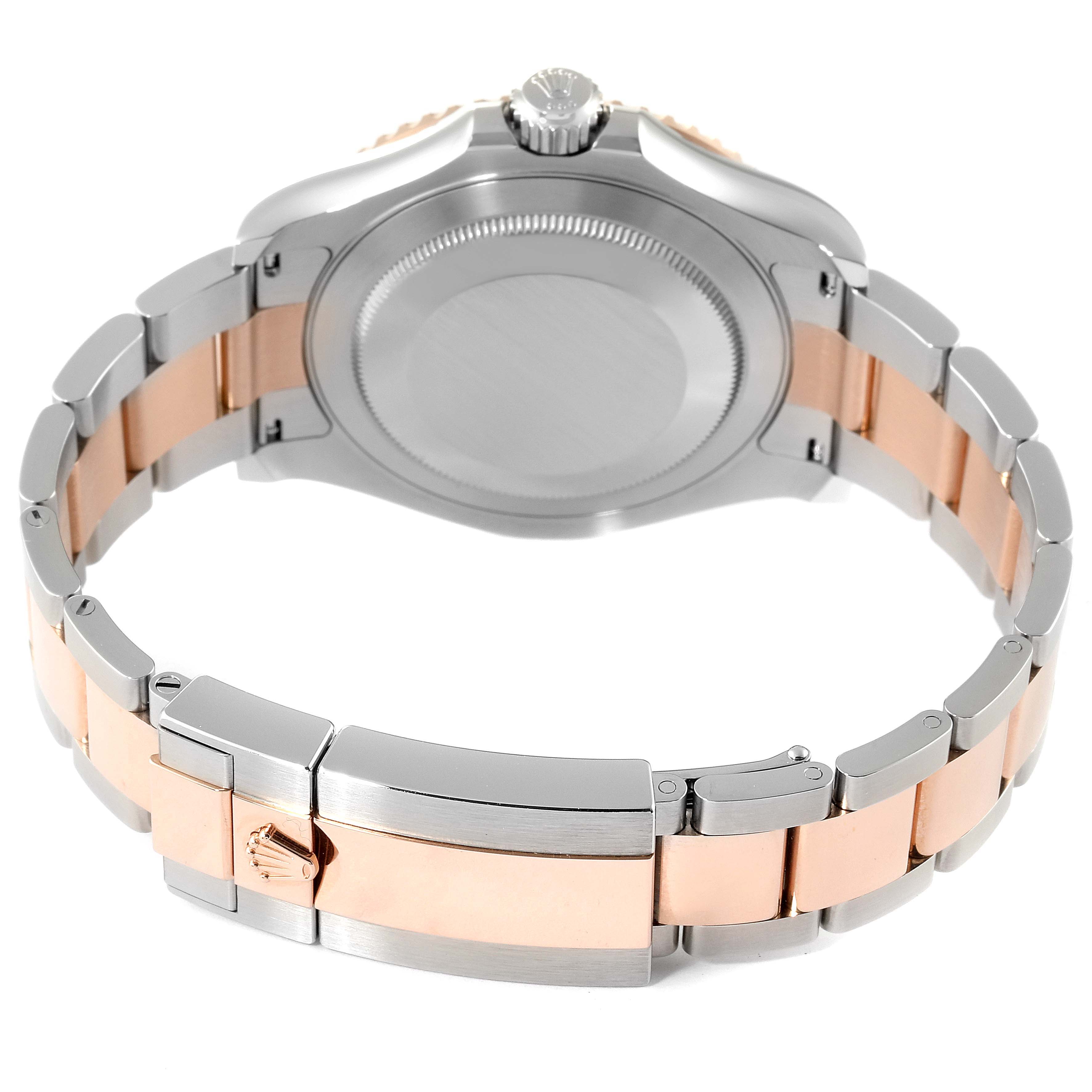 This image of a Rolex Yacht-Master 126621 Men's Steel and Gold (two tone) Brown Dial 126621 Men's Steel and Gold (two tone) Brown Dial watch shows the back case and bracelet from the back at a slight angle.