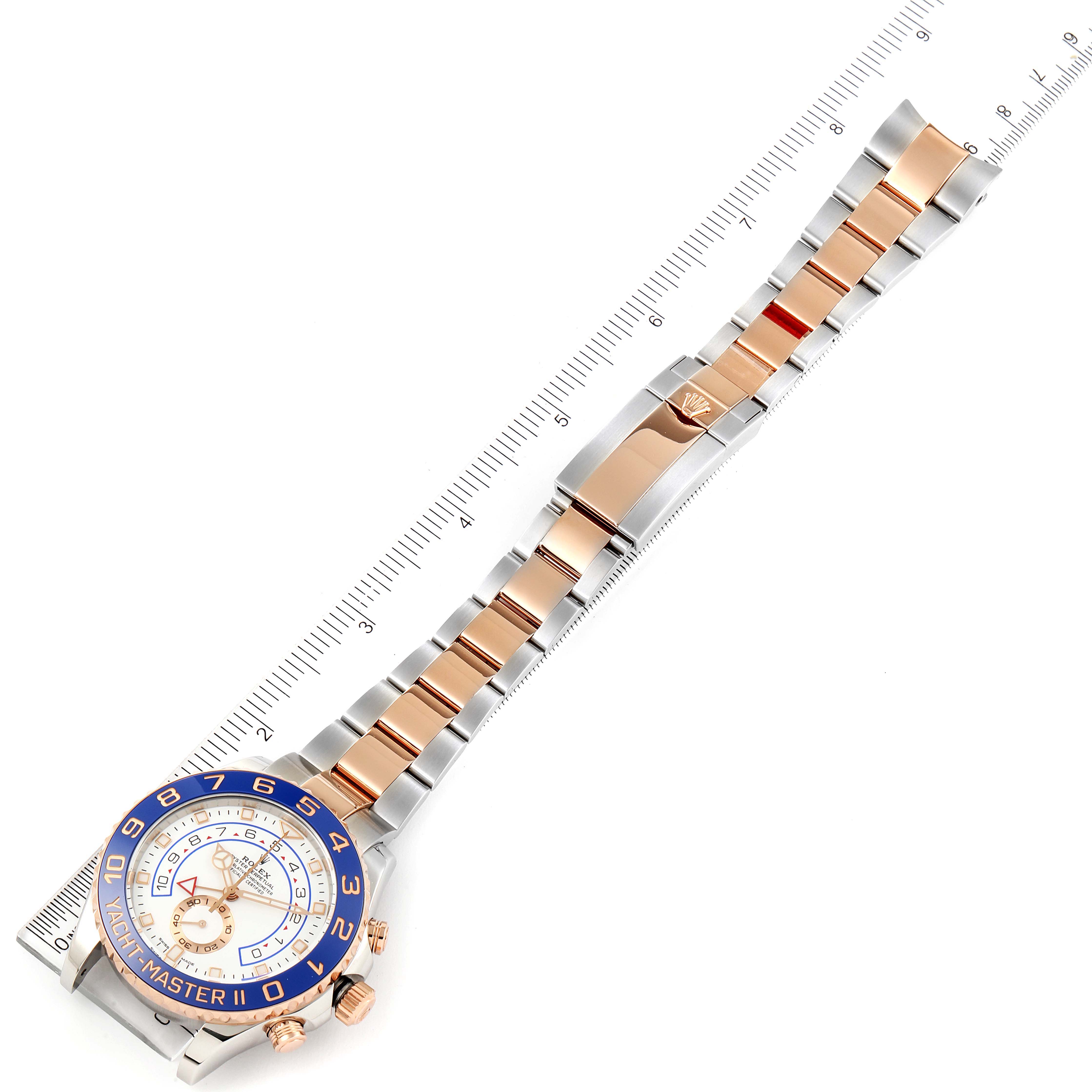 The image shows a top-down view of a Rolex Yacht-Master 116681 Men
s Steel and Gold (two tone) White Dial 116681 Men
s Steel and Gold (two tone) White Dial watch, displaying its face and two-tone bracelet.