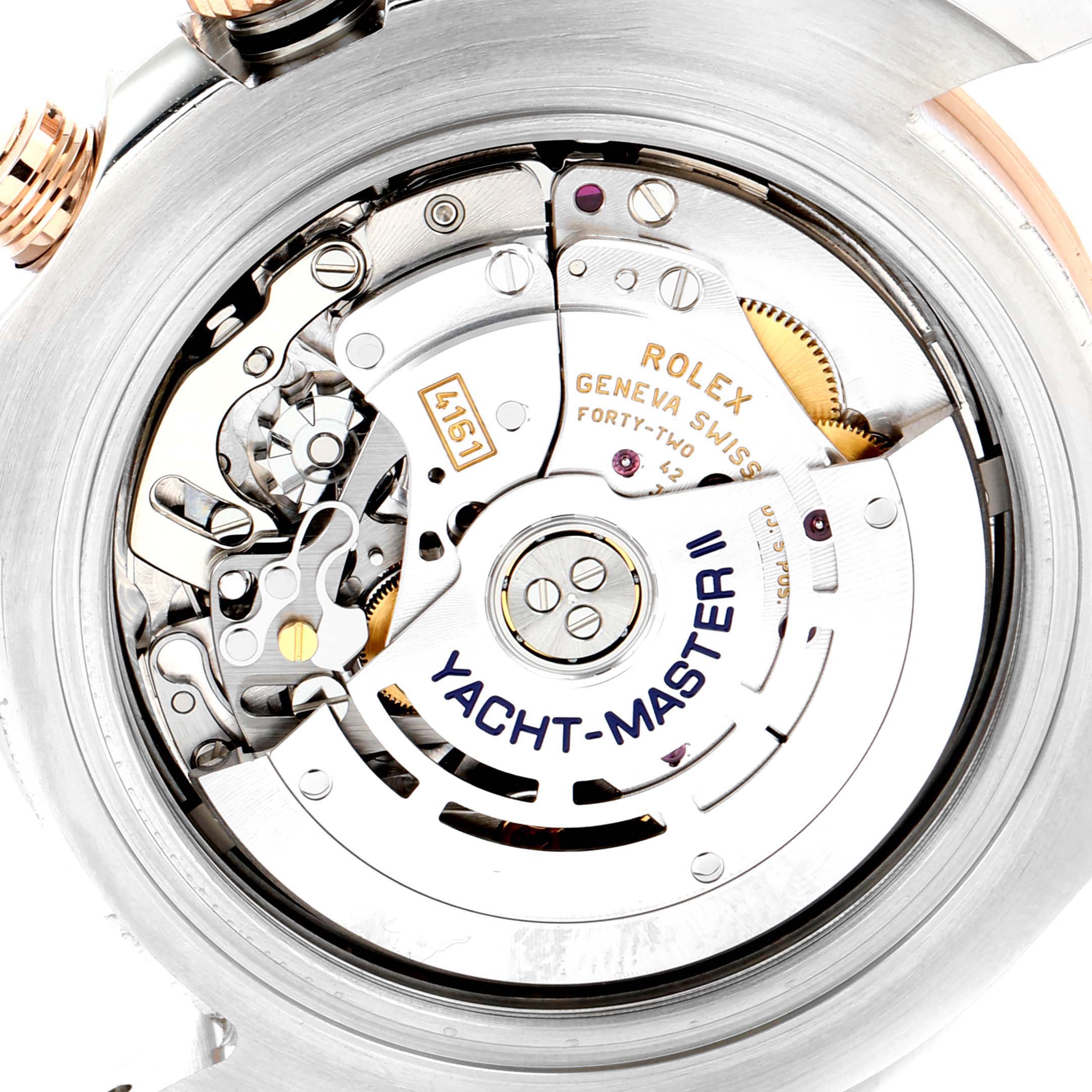 This image shows the Rolex Yacht-Master 116681 Men
s Steel and Gold (two tone) White Dial 116681 Men
s Steel and Gold (two tone) White Dial
s internal movement mechanism from a close-up angle.
