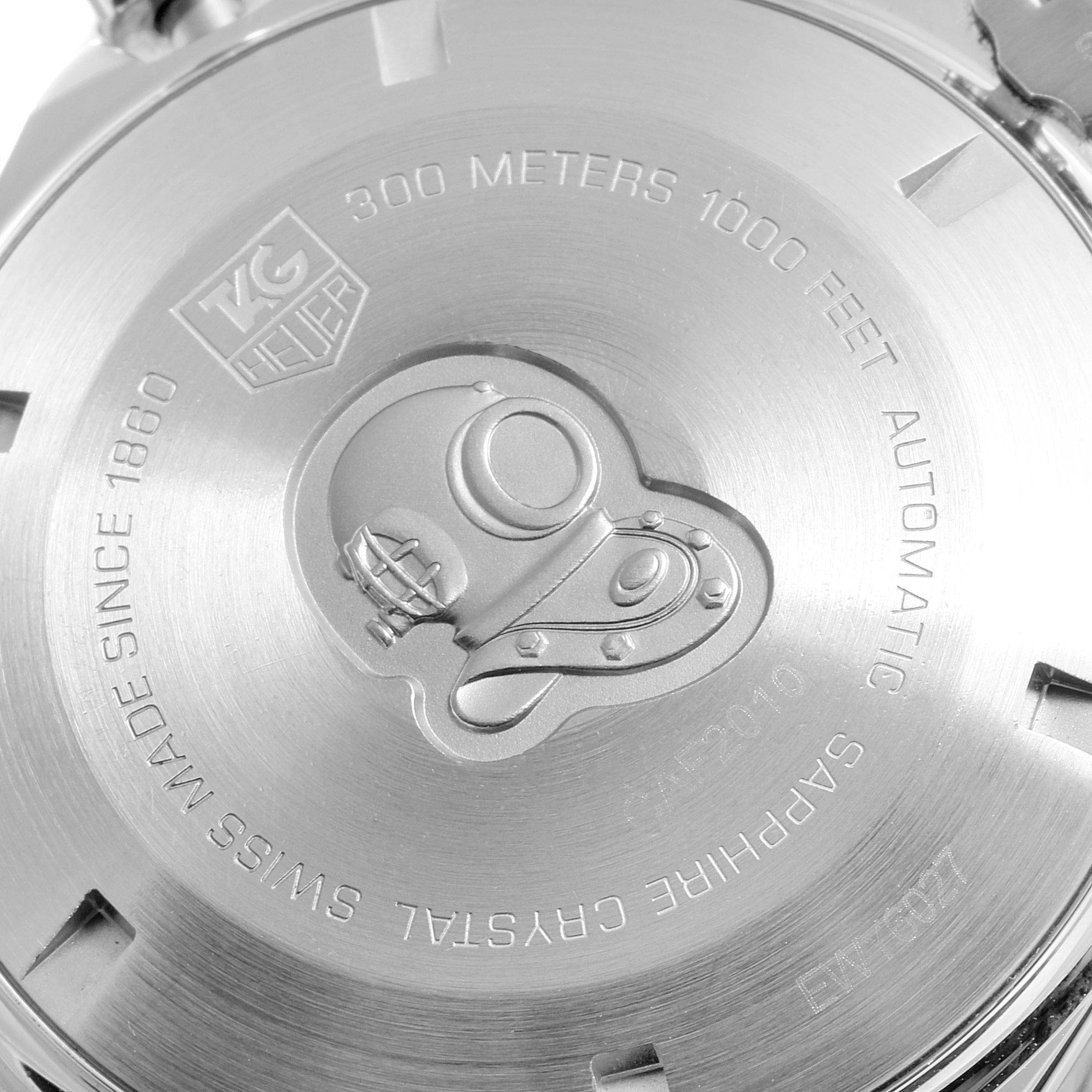 The image shows the back case of a Tag Heuer Aquaracer CAF2010.BA0815 Men's Stainless Steel Black Dial CAF2010.BA0815 Men's Stainless Steel Black Dial watch, highlighting its water resistance, brand engravings, and diving helmet logo.