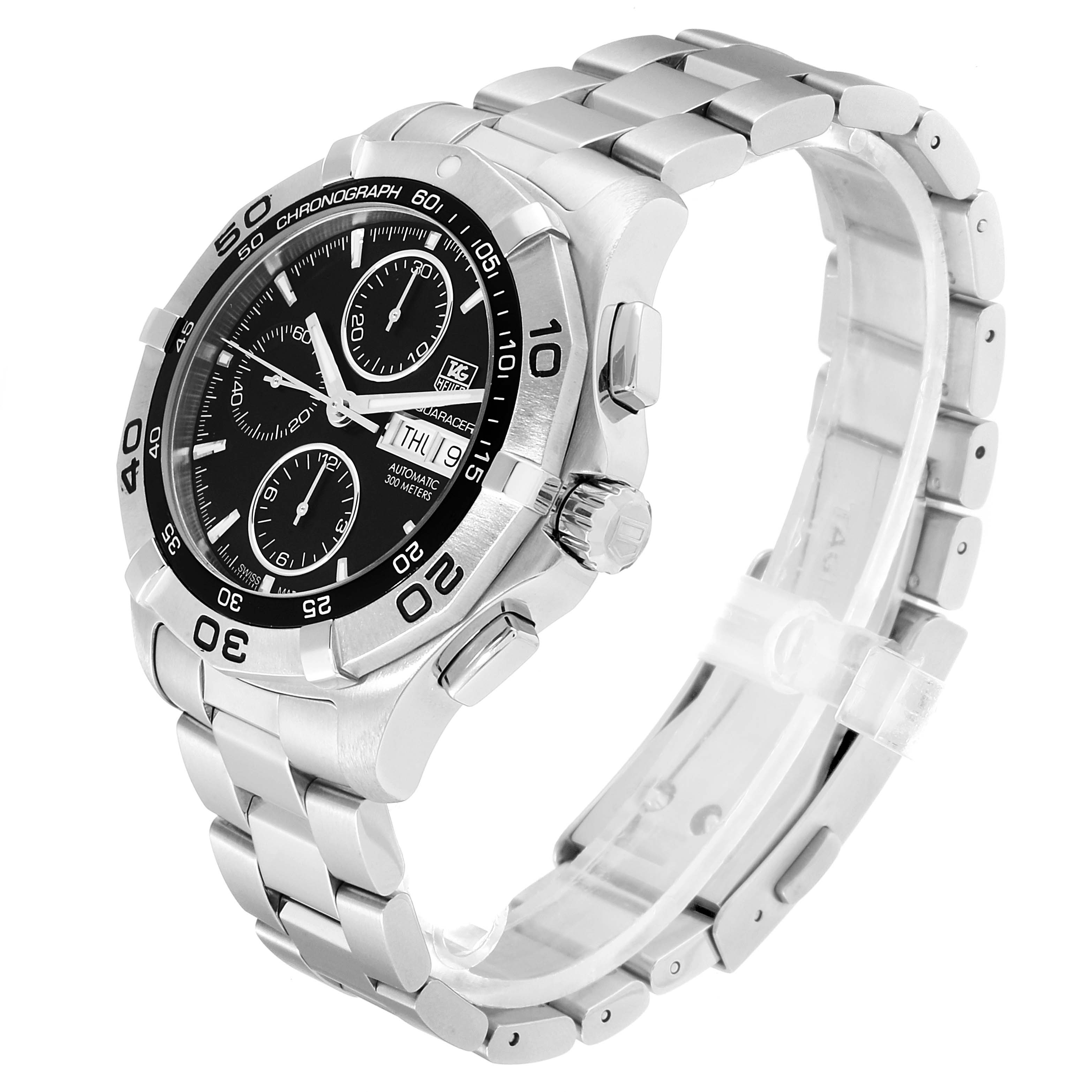 The image shows a side angle view of the Tag Heuer Aquaracer CAF2010.BA0815 Men's Stainless Steel Black Dial CAF2010.BA0815 Men's Stainless Steel Black Dial watch, showcasing its face, bezel, chronograph buttons, and metal band.