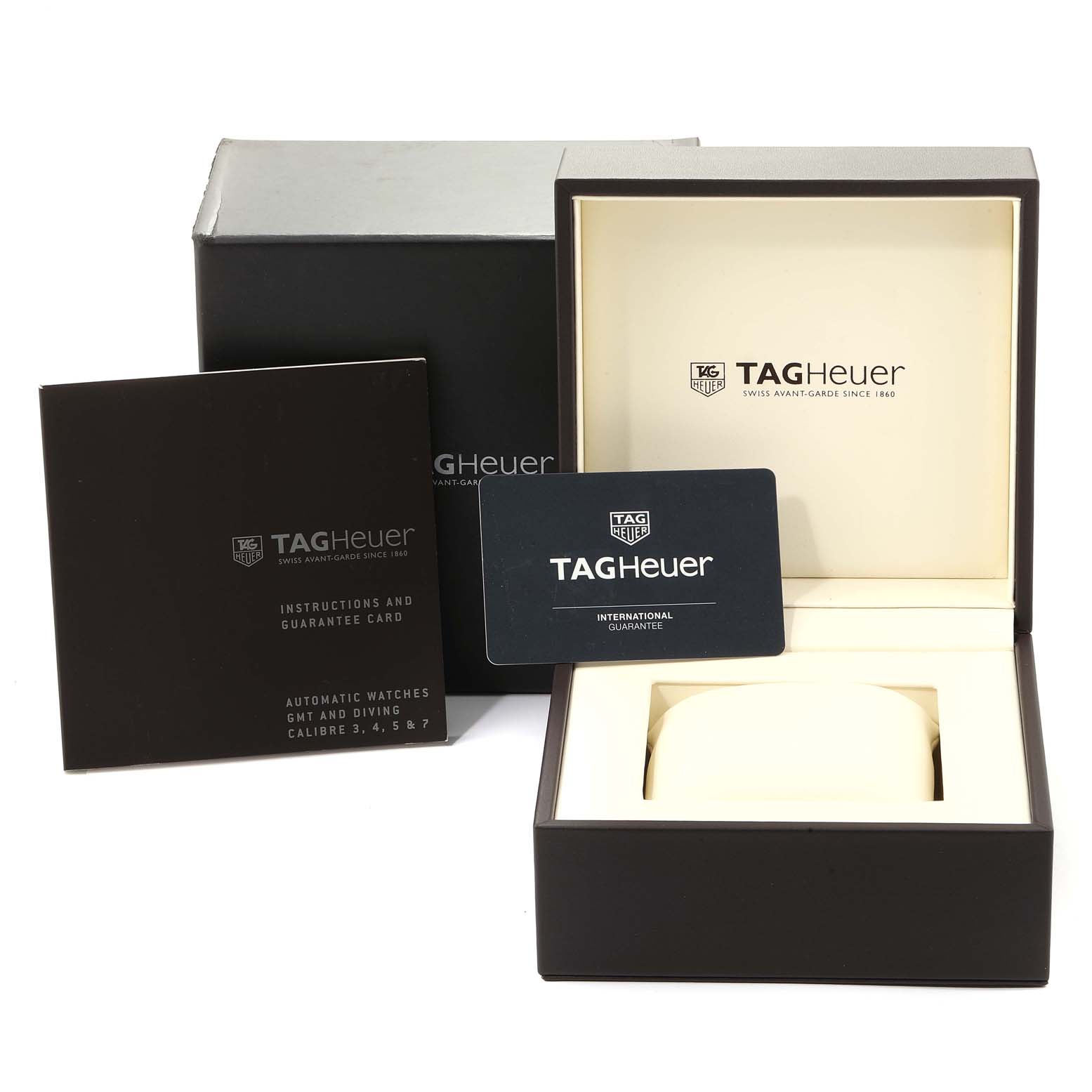 This image shows the box and accessories for the Tag Heuer Aquaracer WAY2110.BA0928 Men's Stainless Steel Black Dial WAY2110.BA0928 Men's Stainless Steel Black Dial, including manuals and an international guarantee card.