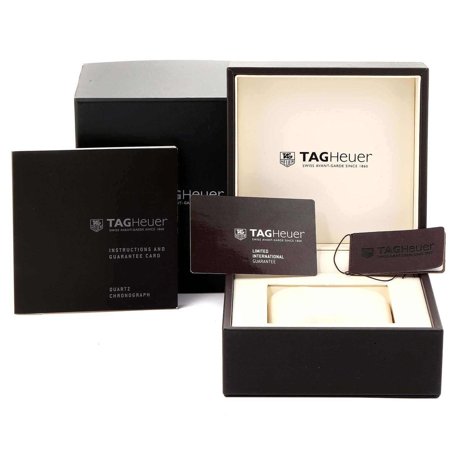 The image shows the Tag Heuer Aquaracer CAY111B.BA0927 Men
s Stainless Steel Blue Dial CAY111B.BA0927 Men
s Stainless Steel Blue Dial packaging, including the box, guarantee card, instruction manual, and tag.