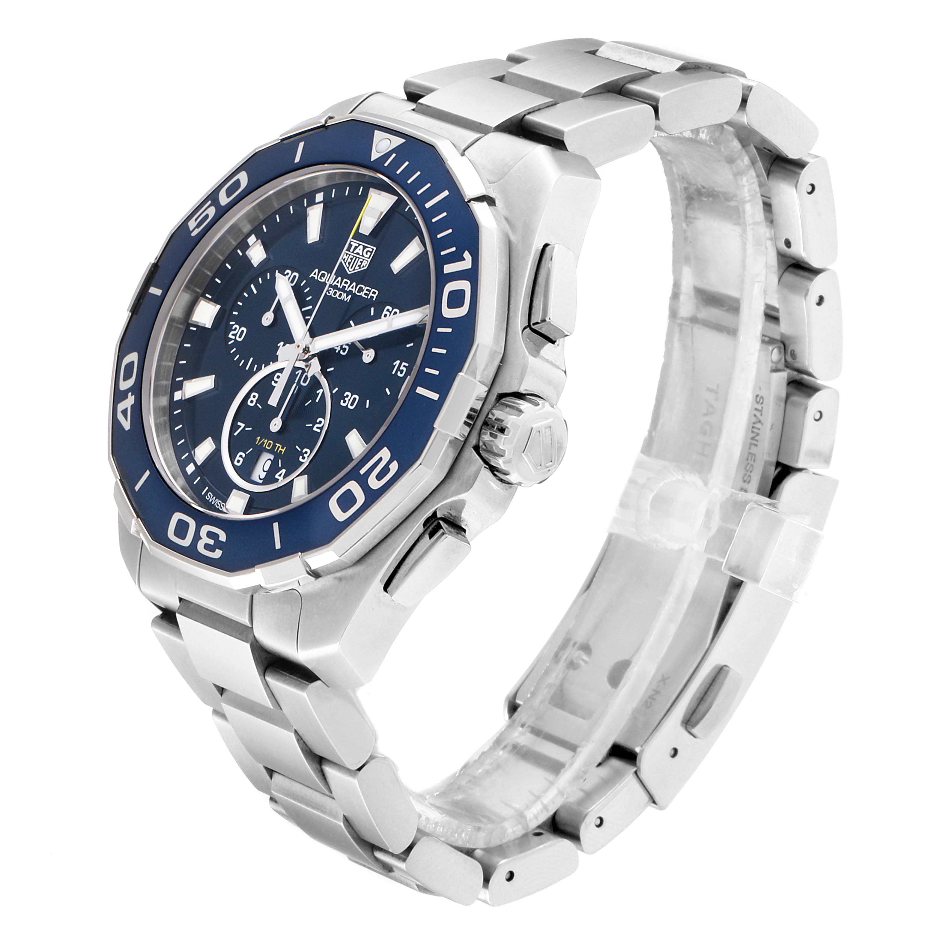 The image shows a side angle view of the Tag Heuer Aquaracer CAY111B.BA0927 Men
s Stainless Steel Blue Dial CAY111B.BA0927 Men
s Stainless Steel Blue Dial watch, highlighting its silver bracelet and blue dial.