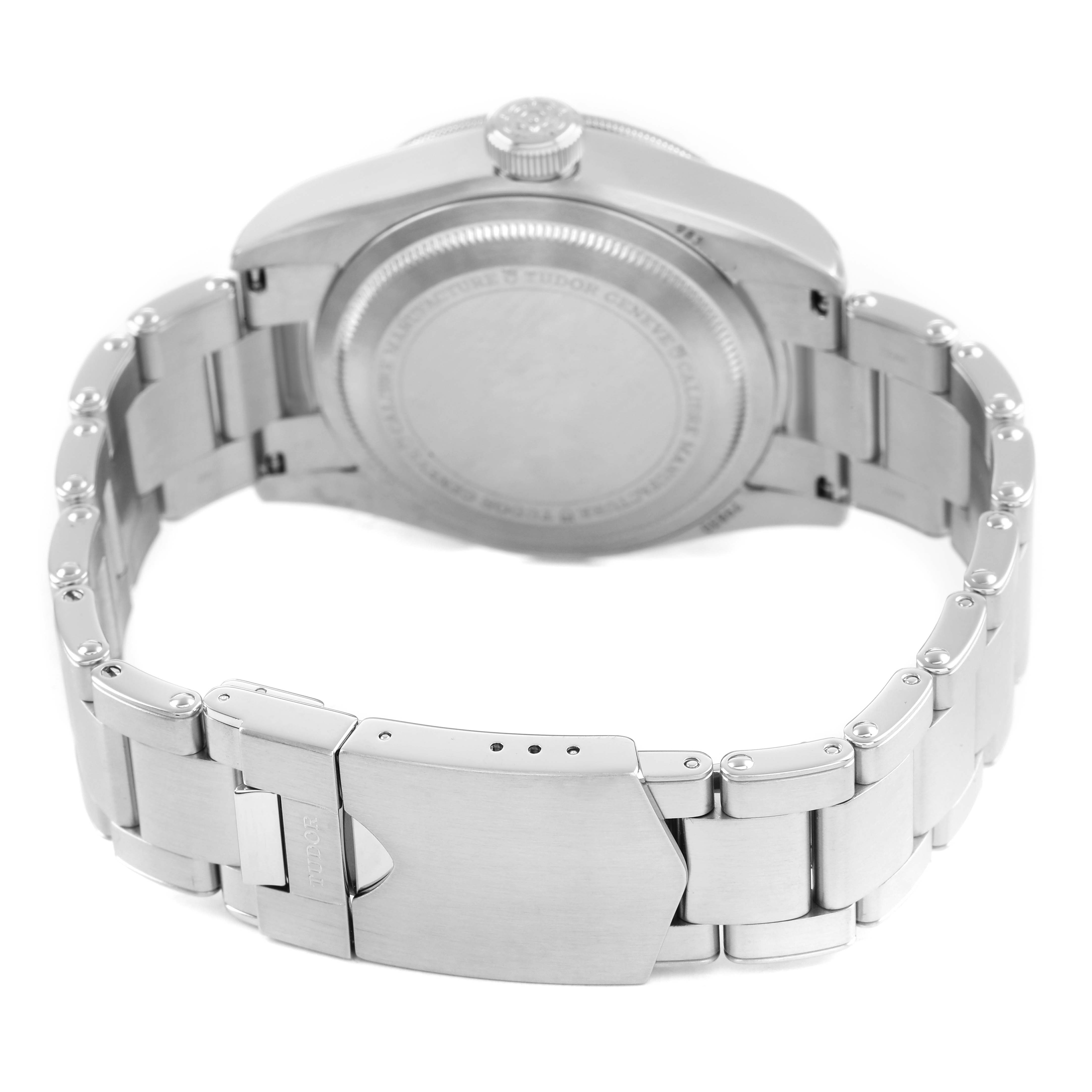 The image shows the back case and bracelet clasp of a Tudor Heritage Black Bay 79830RB Men's Stainless Steel Black Dial watch from a rear angle.
