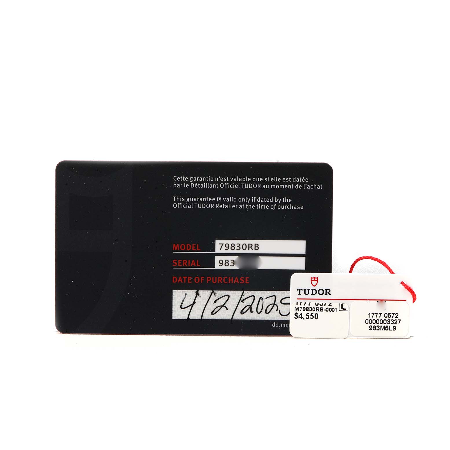 The image shows a warranty card and tags for the Tudor Heritage Black Bay 79830RB Men's Stainless Steel Black Dial model, displaying model, serial, and purchase details.