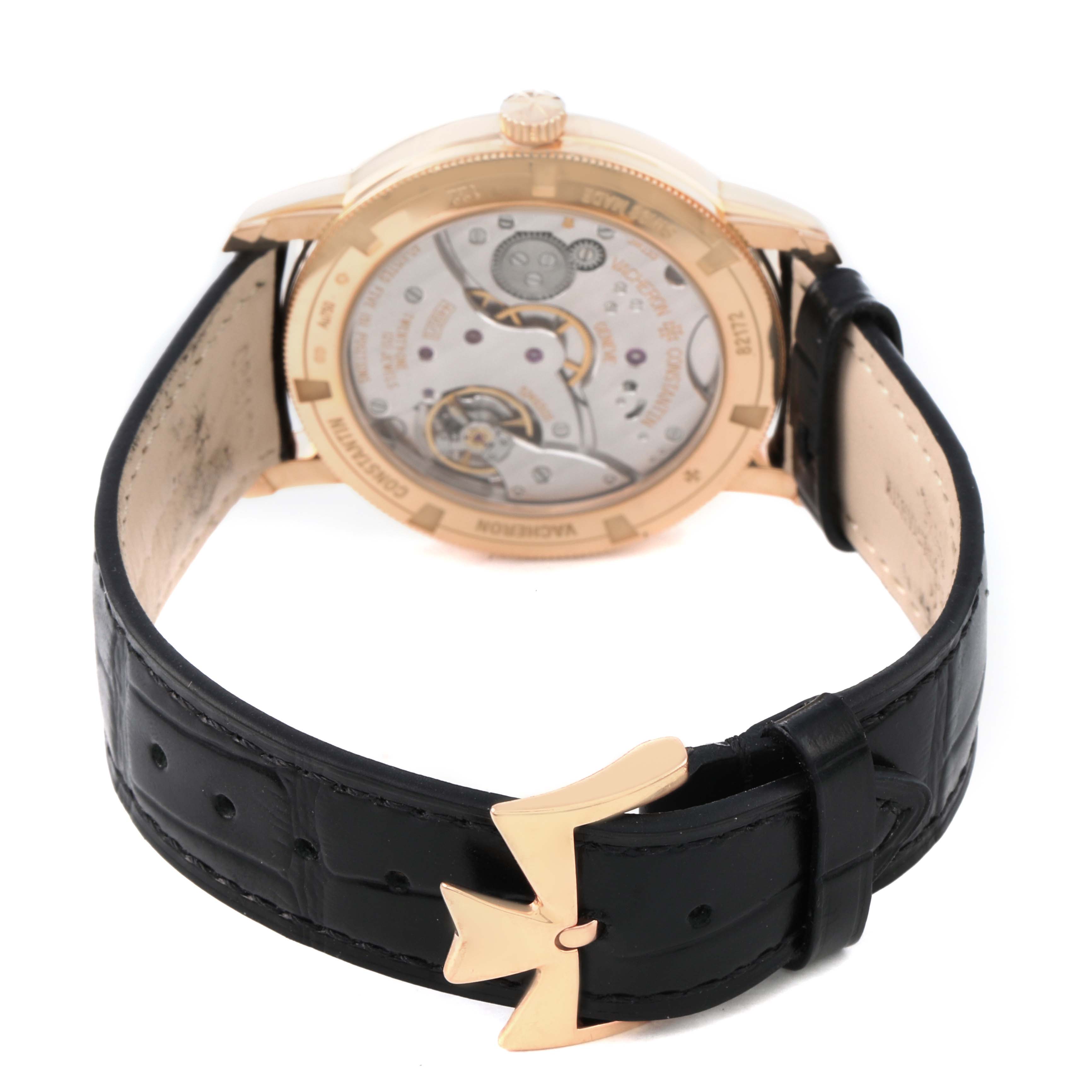 The image shows the back view of a Vacheron Constantin Traditionnelle 82172 Men's Rose Gold Silver Dial watch, highlighting the transparent case back and leather strap.