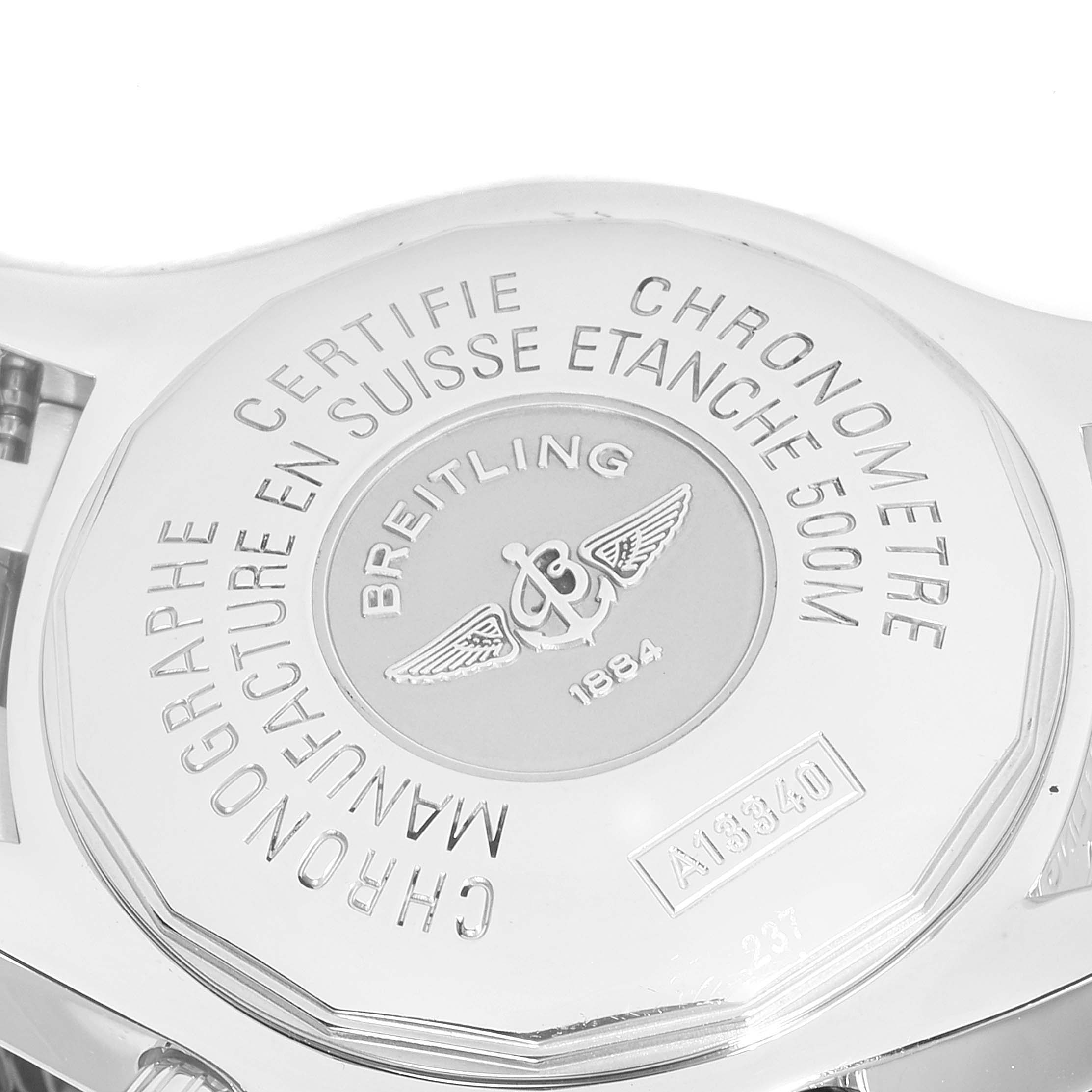 The image shows the engraved caseback of a Breitling Superocean A13340 Men's Stainless Steel Blue Dial A13340 Men's Stainless Steel Blue Dial watch viewed from a close-up angle.