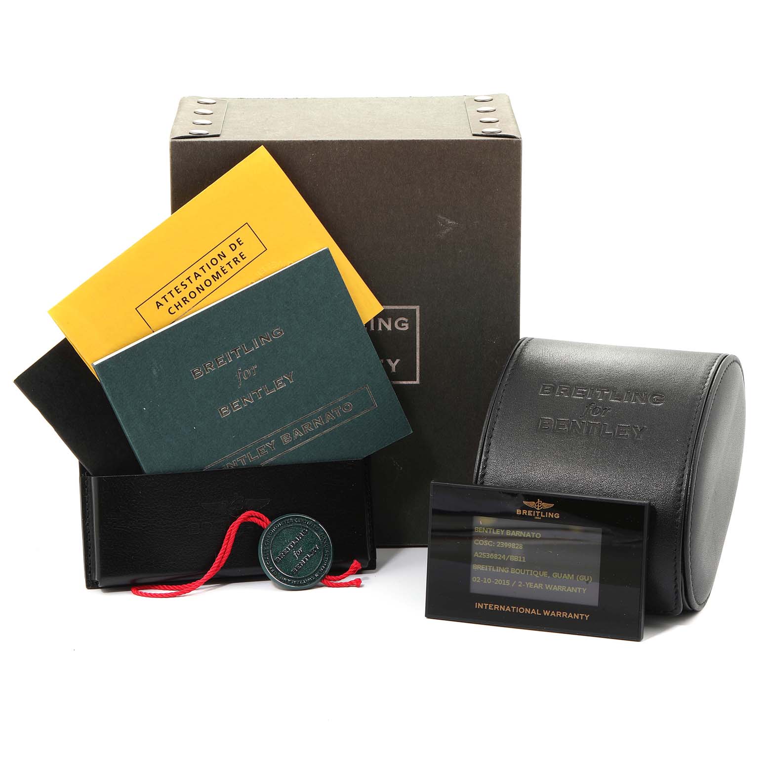 The image shows a Bentley model by Breitling watch's box, booklet, warranty card, and embossed travel case from a front angle.