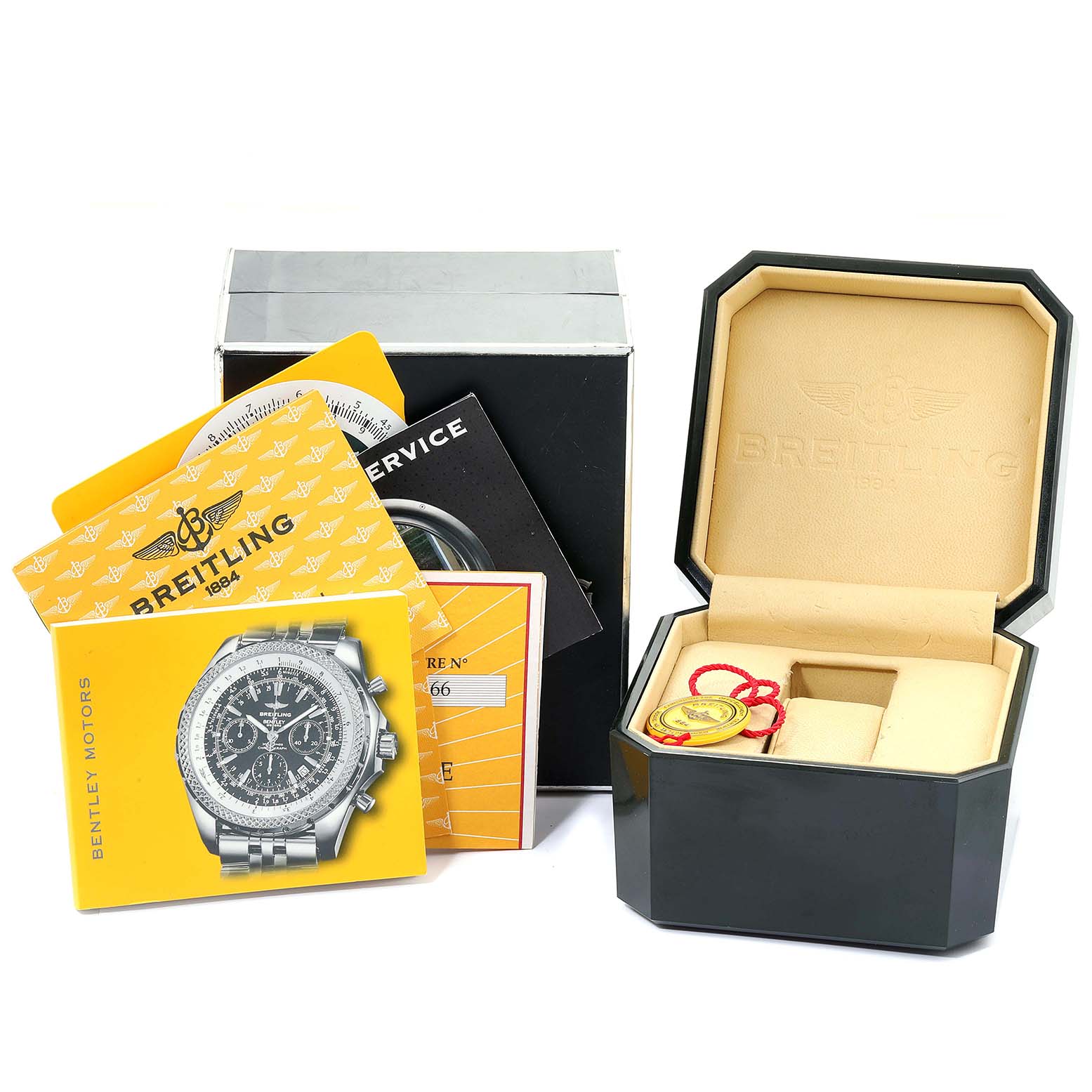 This image shows the packaging, manuals, and open watch box for a Breitling Bentley A25362 Men's Stainless Steel Brown Dial A25362 Men's Stainless Steel Brown Dial model watch.