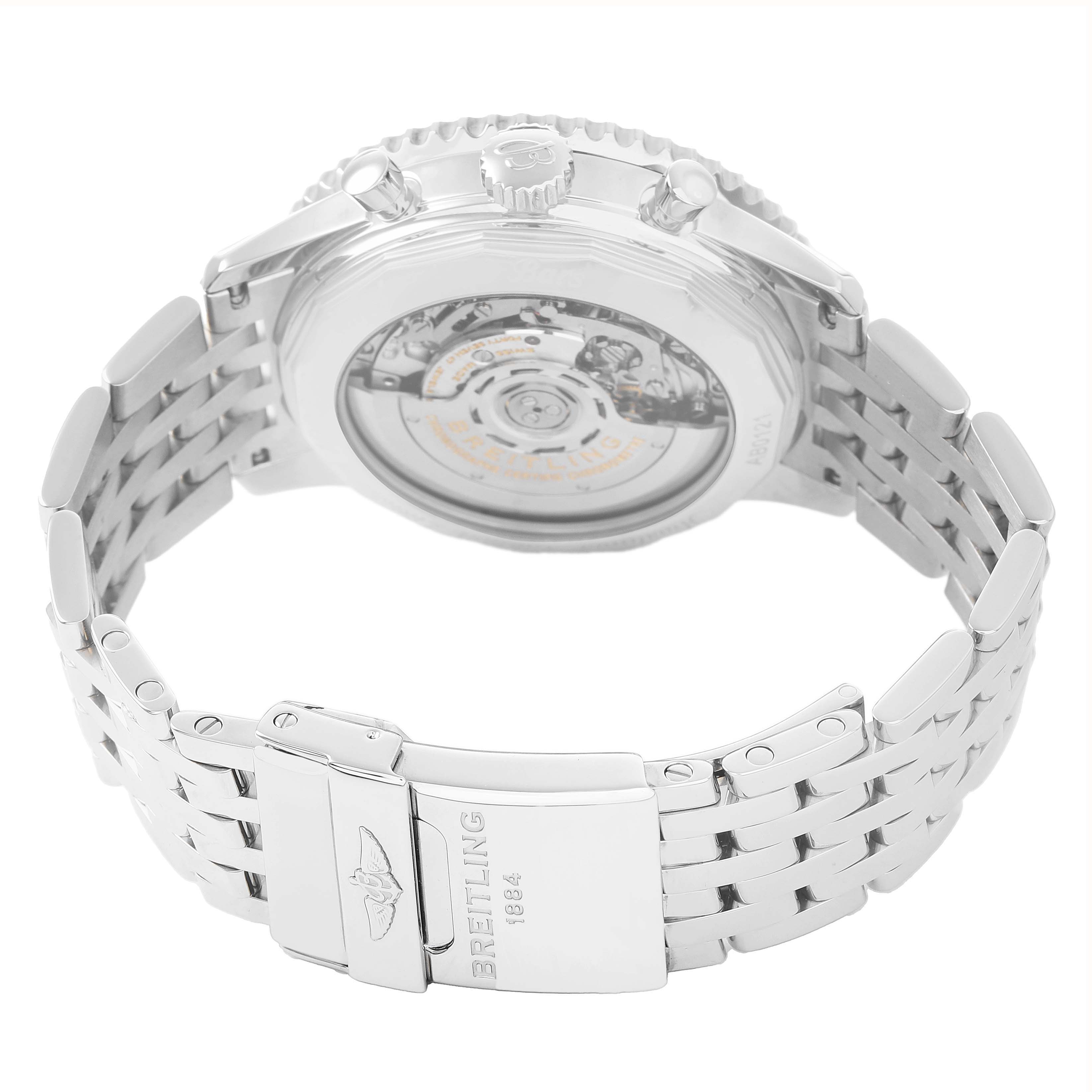 The image shows the Breitling Navitimer AB0121C4/C920 Men's Stainless Steel Blue Dial watch from the back, highlighting its exhibition caseback and metal bracelet.