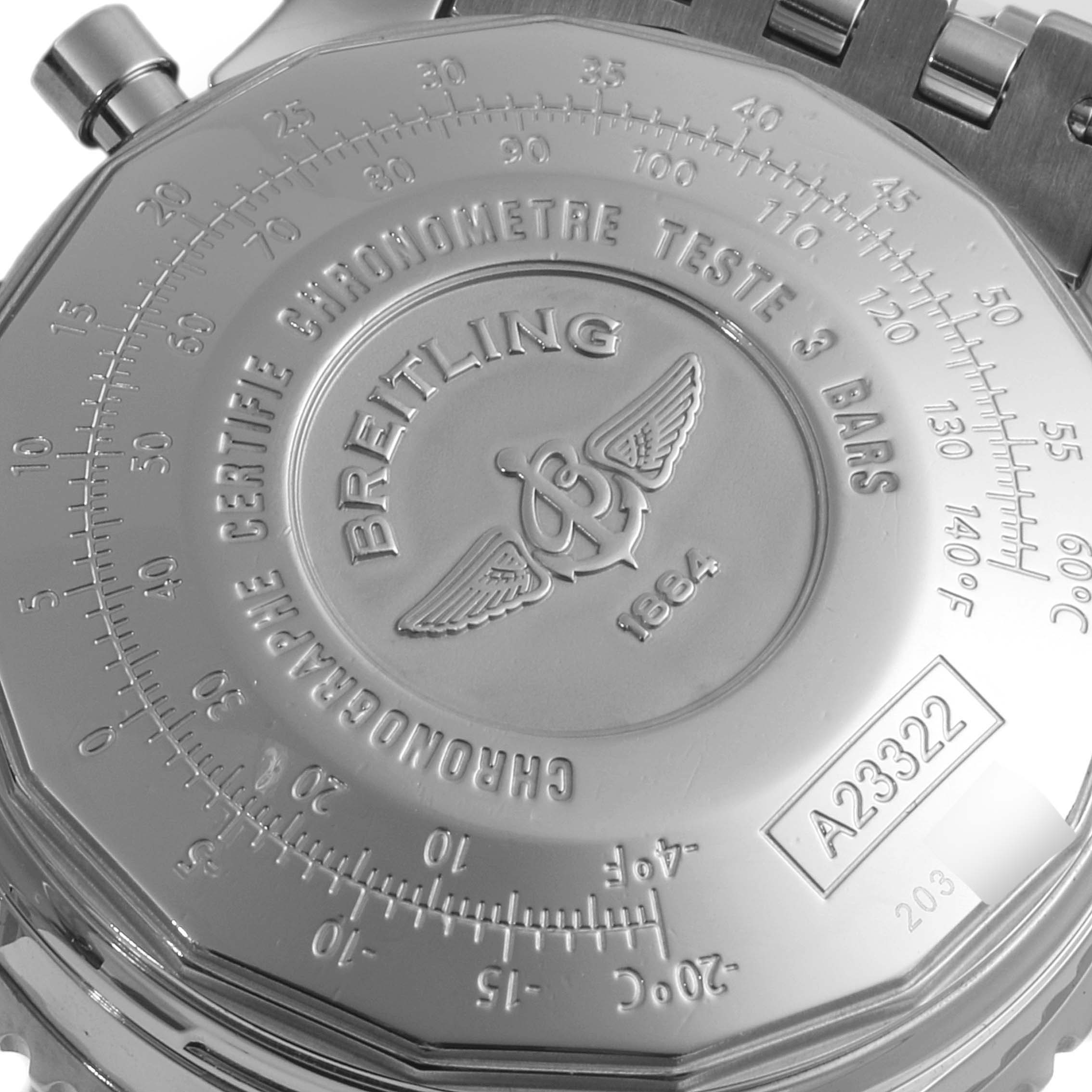 The image shows the back case of a Breitling Navitimer A23322 Men's Stainless Steel Silver Dial A23322 Men's Stainless Steel Silver Dial watch, highlighting its engravings and detailing.