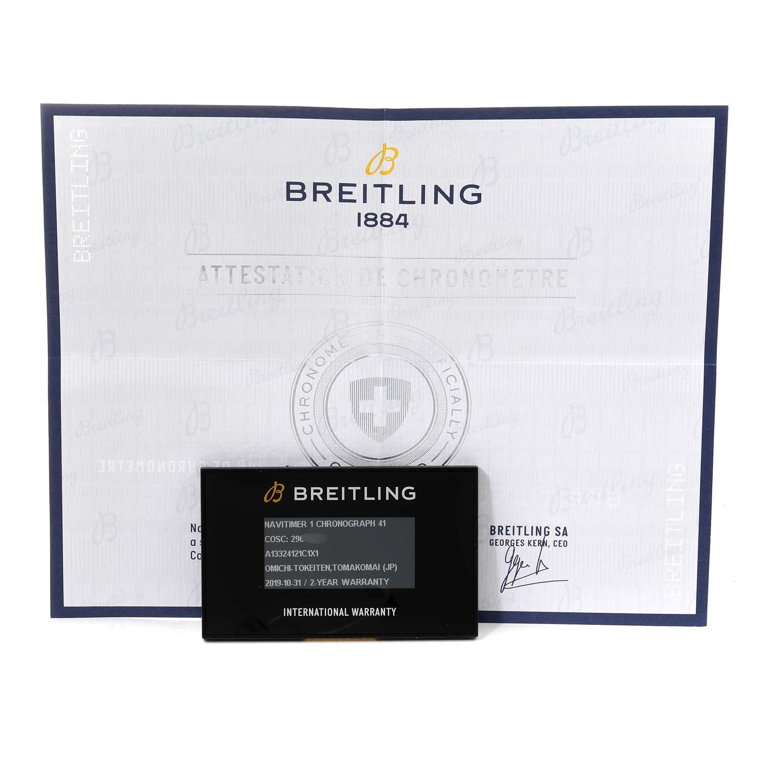 The image shows the warranty card and chronometer certificate for a Breitling Navitimer A13324 Men
s Stainless Steel Blue Dial A13324 Men
s Stainless Steel Blue Dial model.