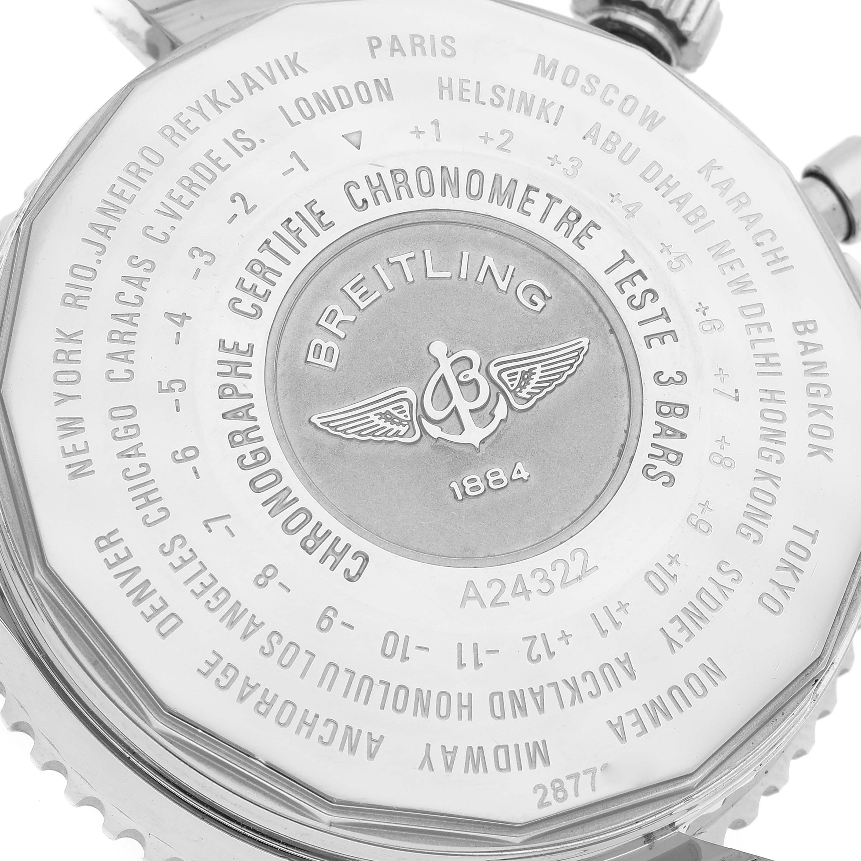 The image shows the back case of a Breitling Navitimer A2432212 Men's Stainless Steel Blue Dial A2432212 Men's Stainless Steel Blue Dial watch, displaying time zone cities and the brand's logo.