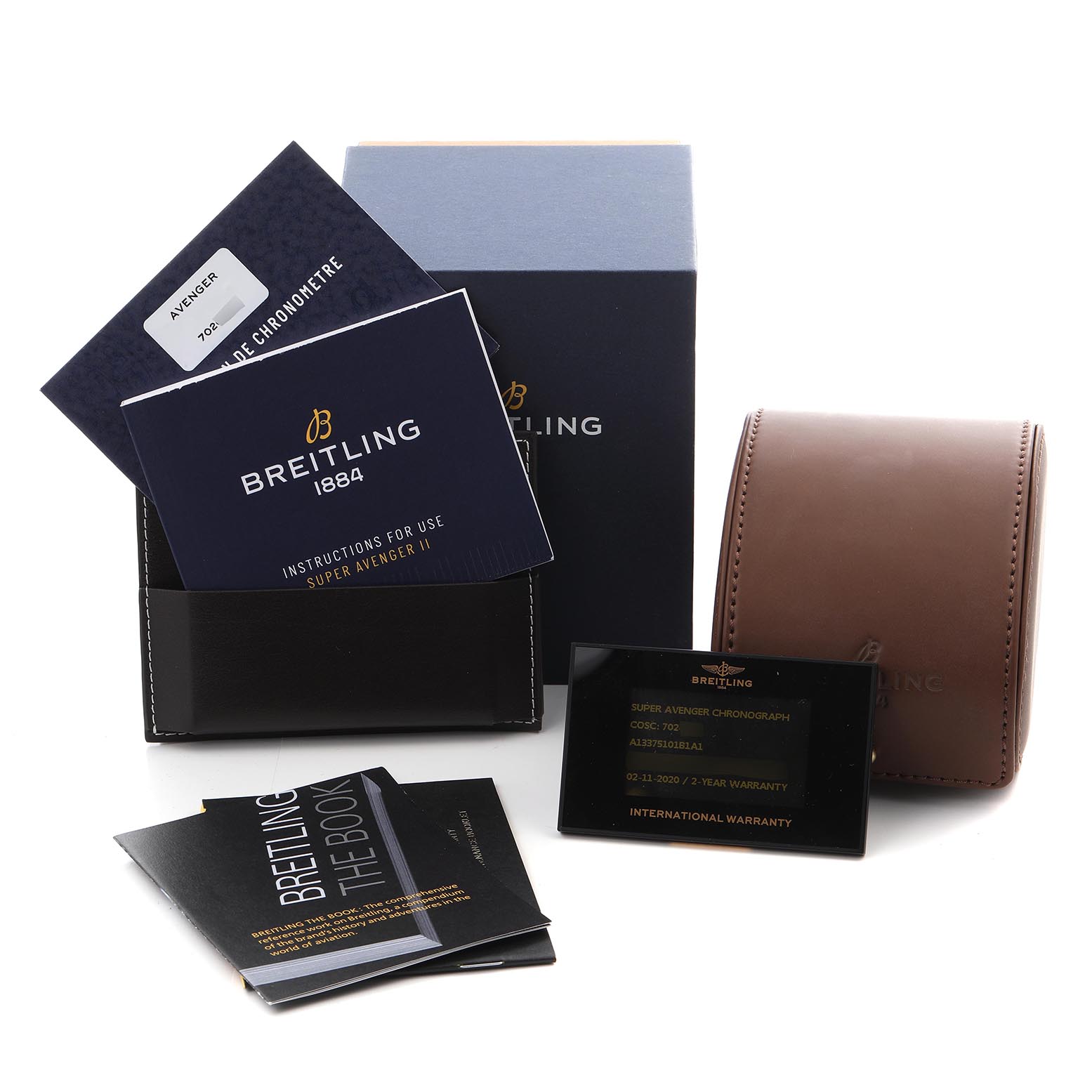 The image shows Breitling Avenger A13375 Men
s Stainless Steel Black Dial A13375 Men
s Stainless Steel Black Dial watch accessories including manuals, a warranty card, a box, and a brown leather case.