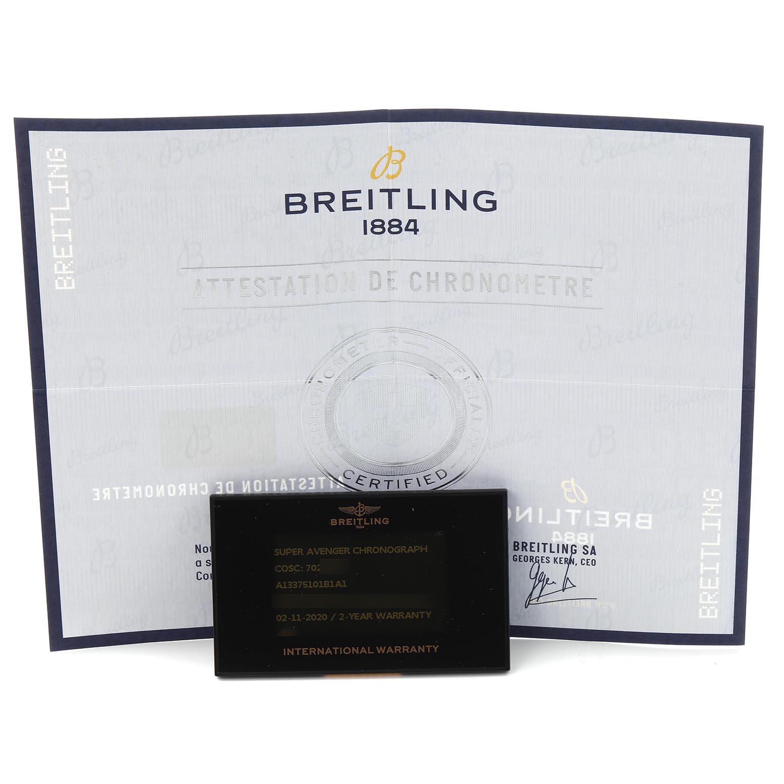 The image shows a warranty card and certificate for a Breitling Avenger A13375 Men
s Stainless Steel Black Dial A13375 Men
s Stainless Steel Black Dial watch.