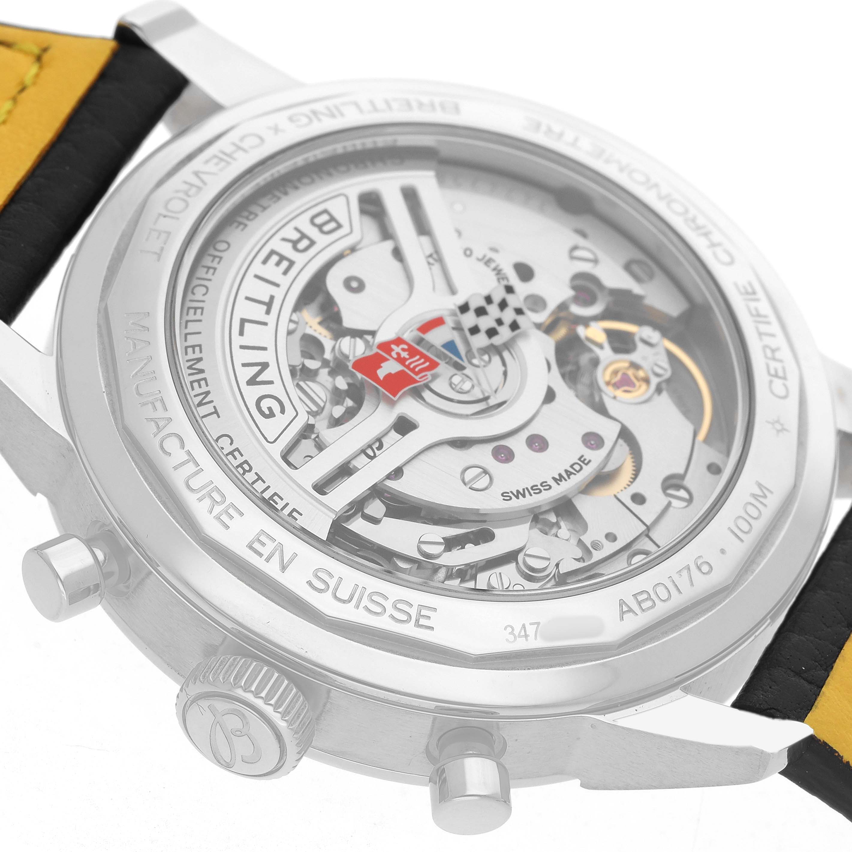 The Breitling Premier AB0176 Men's Stainless Steel Red Dial watch is shown from the back, displaying its transparent case, movement, and crown.