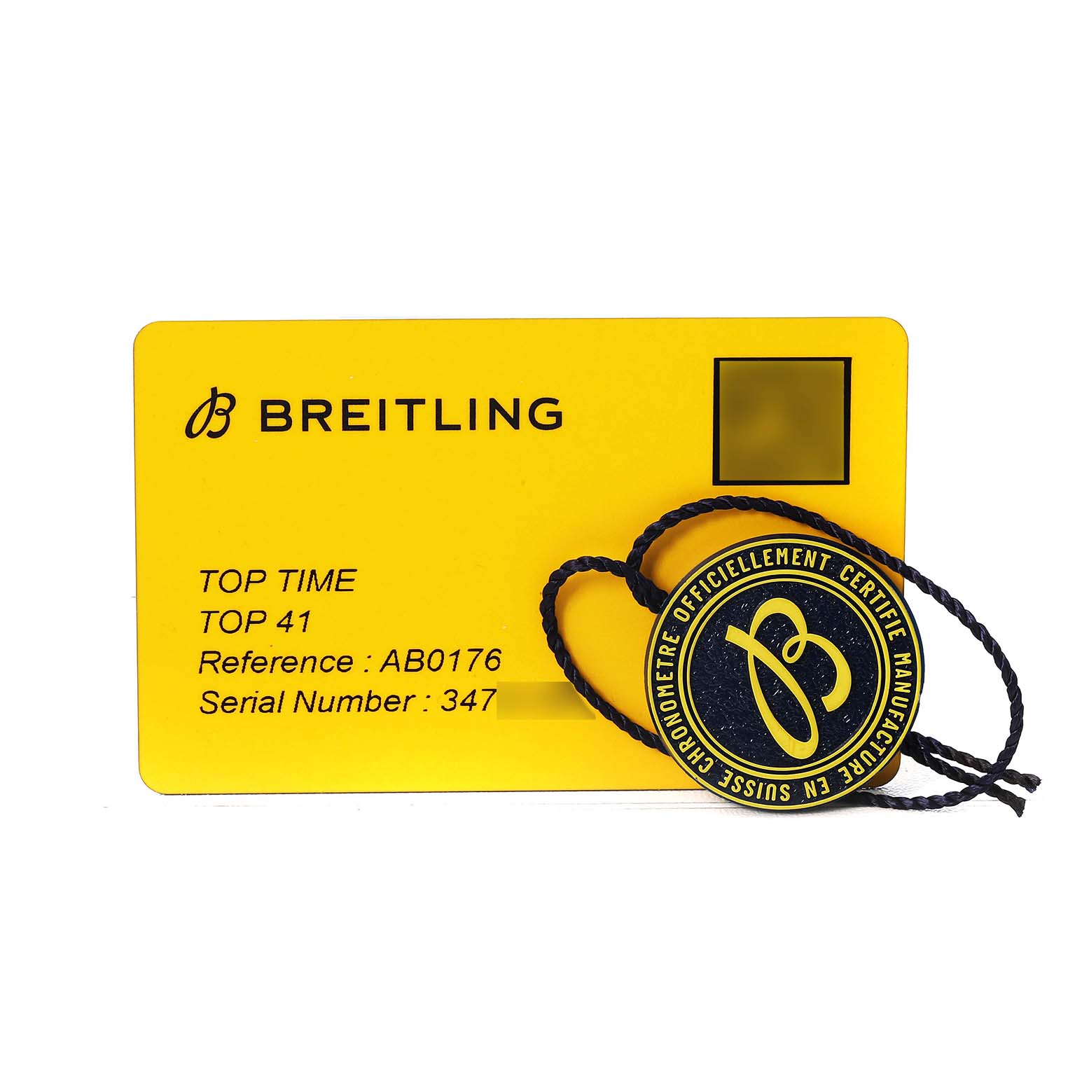 The image shows a Breitling Premier AB0176 Men's Stainless Steel Red Dial model authentication card with reference and serial numbers, alongside a certification tag.