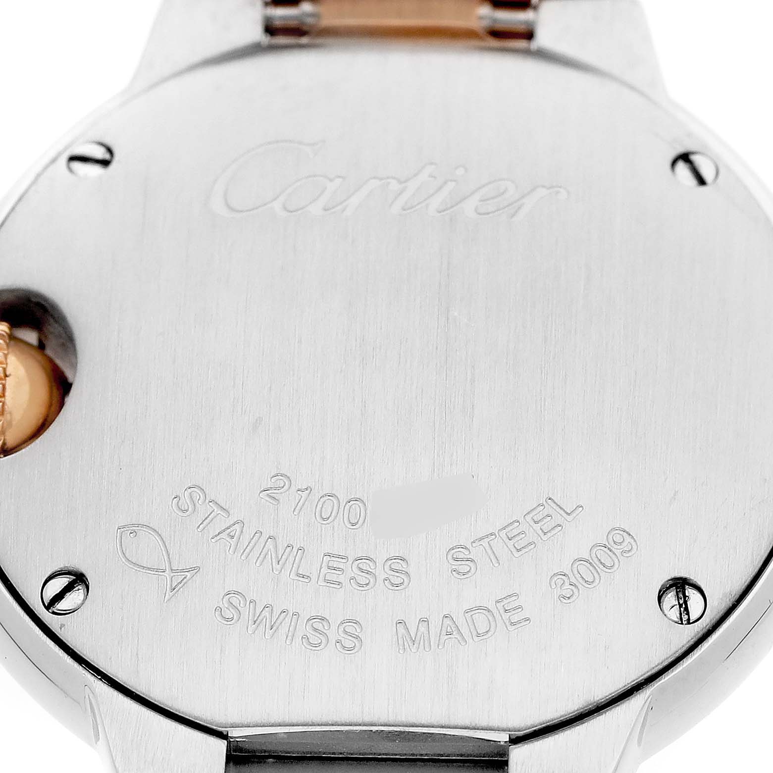 The image shows the back case of a Cartier Ballon Bleu W6920034 Women's Steel and Gold (two tone) Mother of Pearl Dial watch, featuring the brand name and material details.