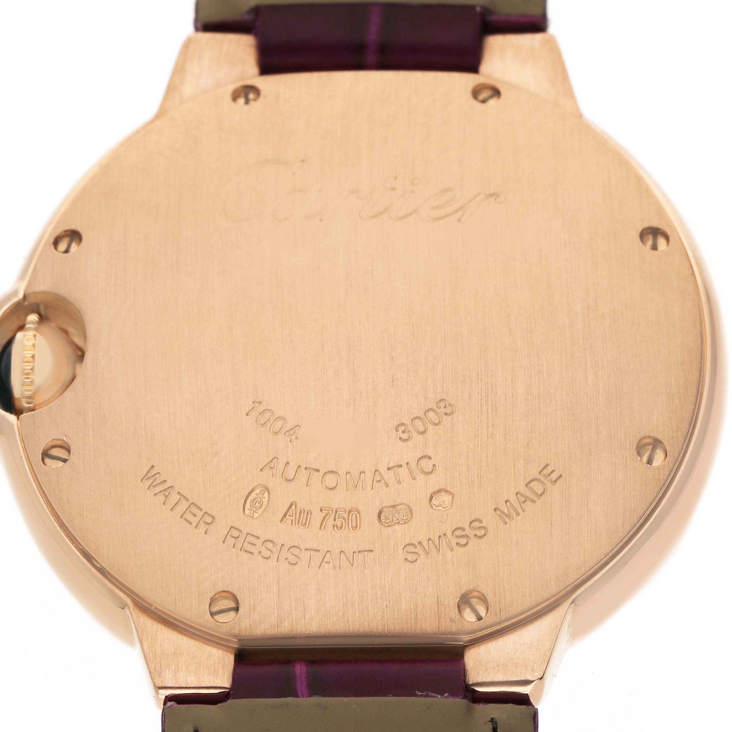 The image shows the back of the Cartier Ballon Bleu WGBB0009 Women's Rose Gold Silver Dial watch, highlighting engravings and strap attachments.