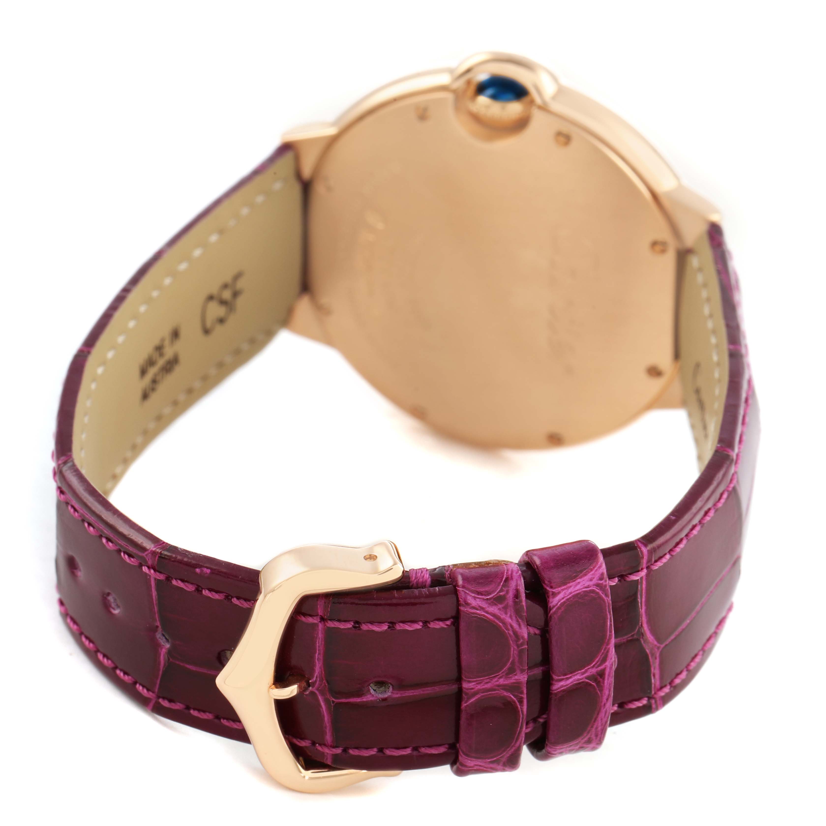 The image shows the back and strap of a Ballon Bleu de Cartier watch, highlighting the clasp and leather band.