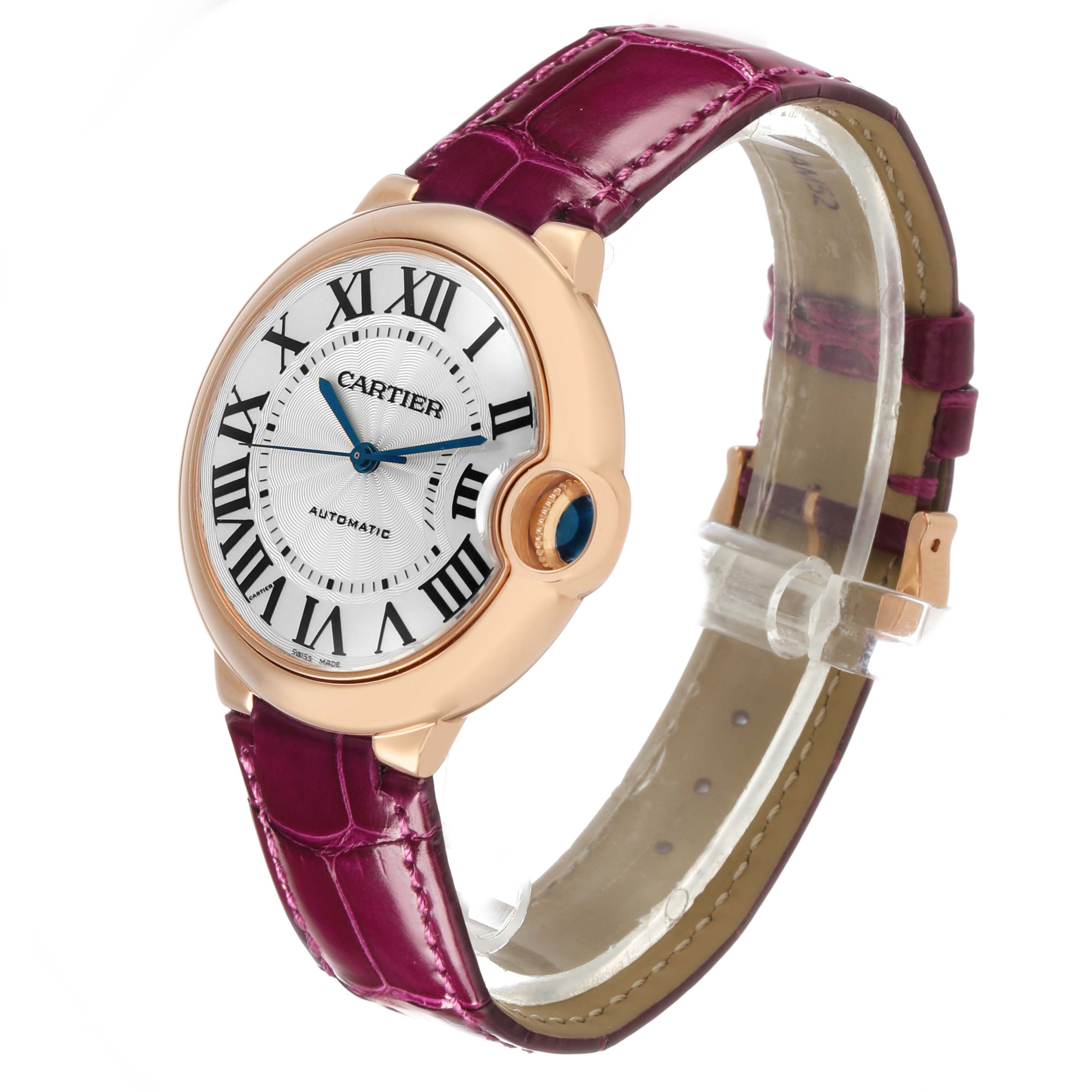 The Cartier Ballon Bleu WGBB0009 Women's Rose Gold Silver Dial watch is shown at a side angle, displaying its Roman numeral dial, blue hands, crown, and pink leather strap.