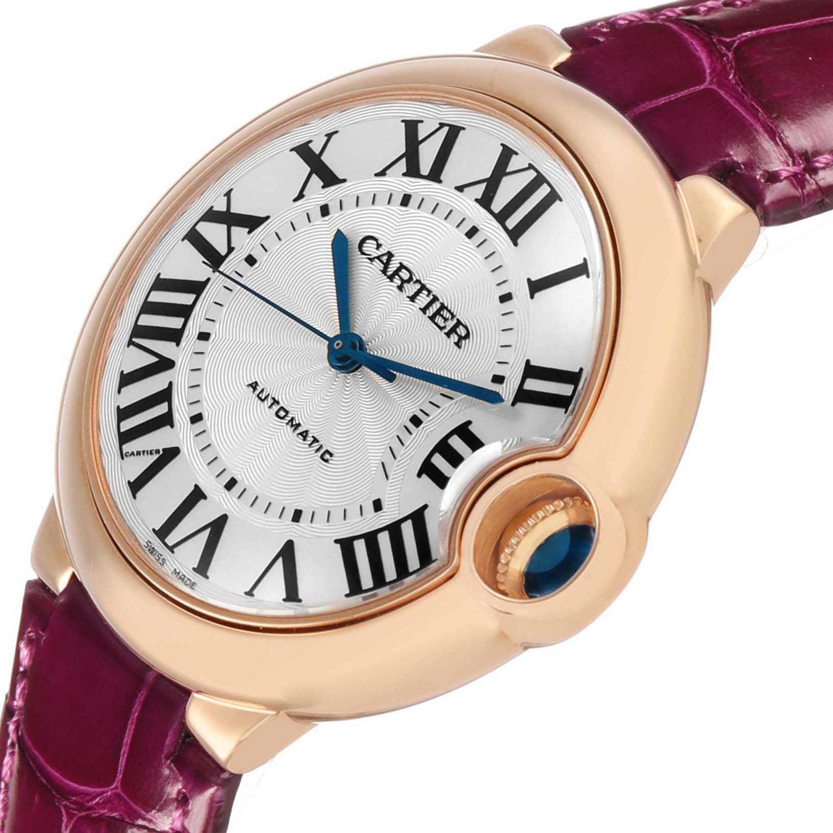 The Cartier Ballon Bleu WGBB0009 Women's Rose Gold Silver Dial watch is shown at an angle highlighting the face, Roman numerals, and pink leather strap.