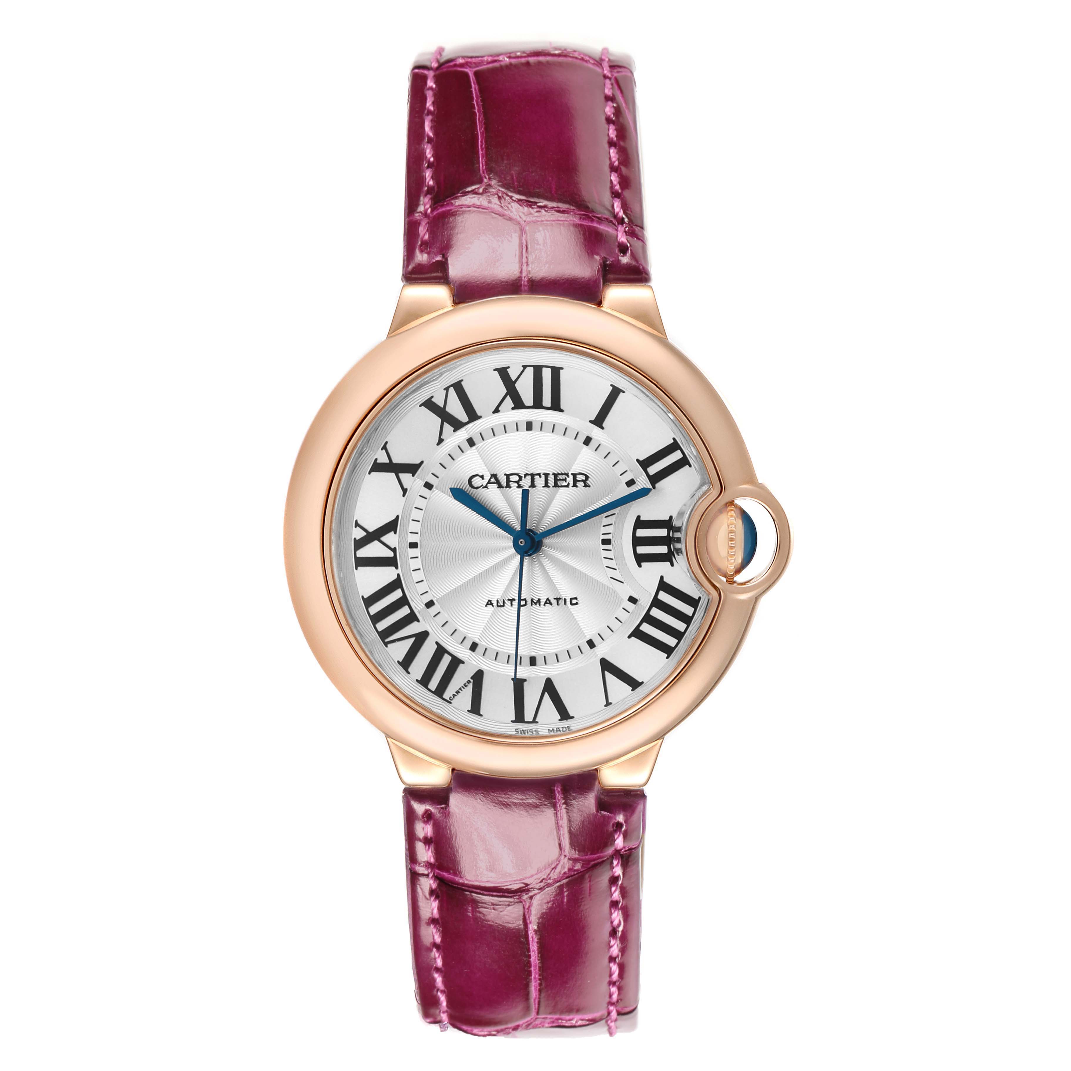 The Cartier Ballon Bleu WGBB0009 Women's Rose Gold Silver Dial watch is shown from a top-down angle, displaying its face, case, and strap clearly.