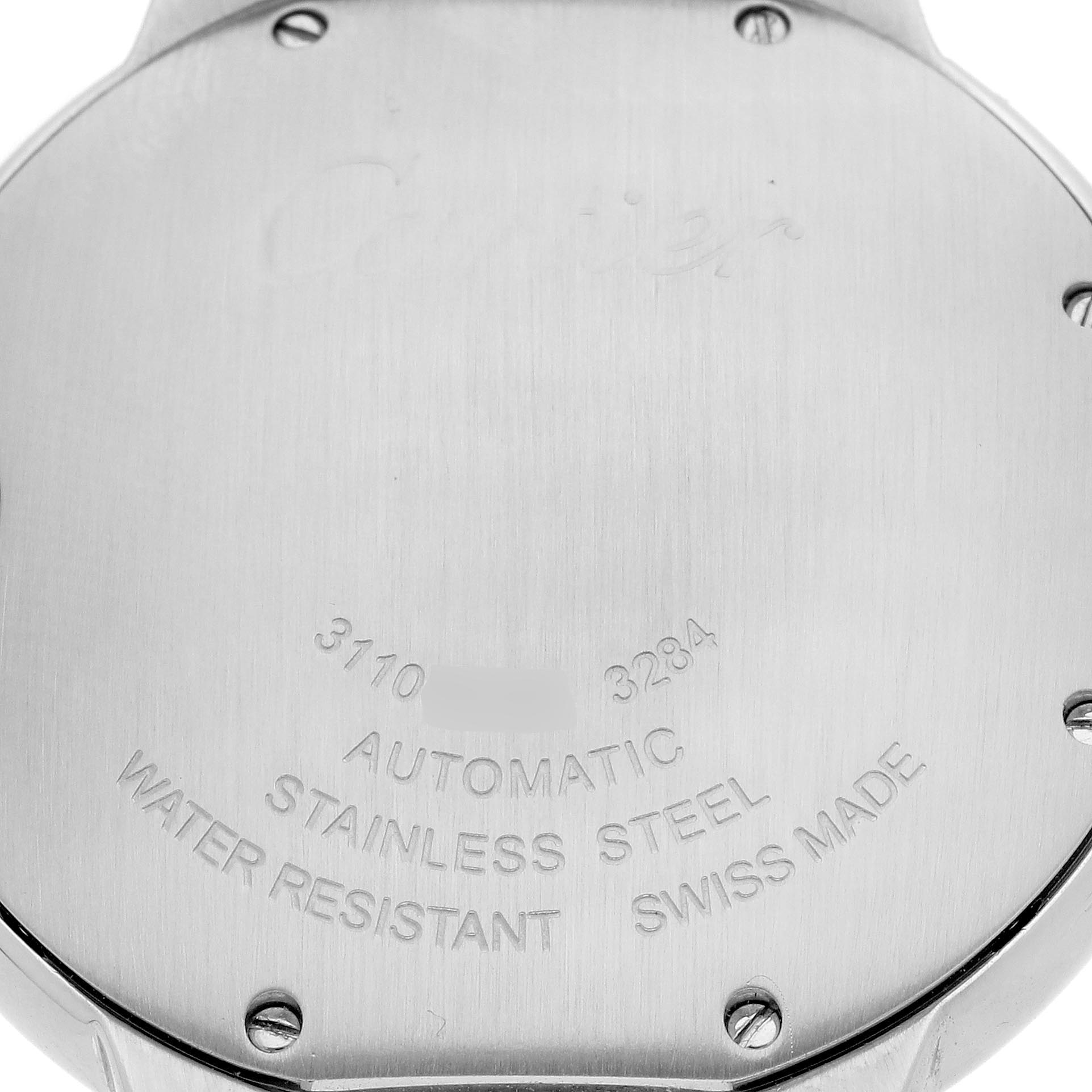 The image shows the back case of the Ballon Bleu by Cartier, displaying engravings and screws.