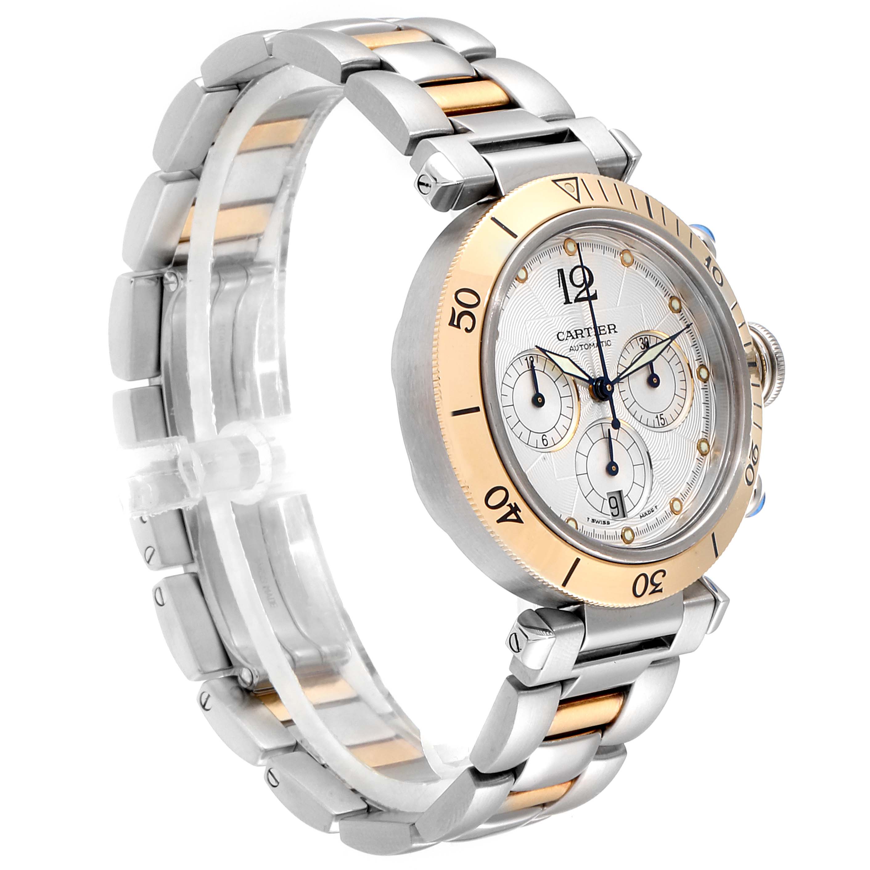 The Cartier Pasha W31036T6 Men's Steel and Gold (two tone) Silver Dial W31036T6 Men's Steel and Gold (two tone) Silver Dial watch is shown from an angled side view, highlighting the bracelet, bezel, and face with chronograph features.