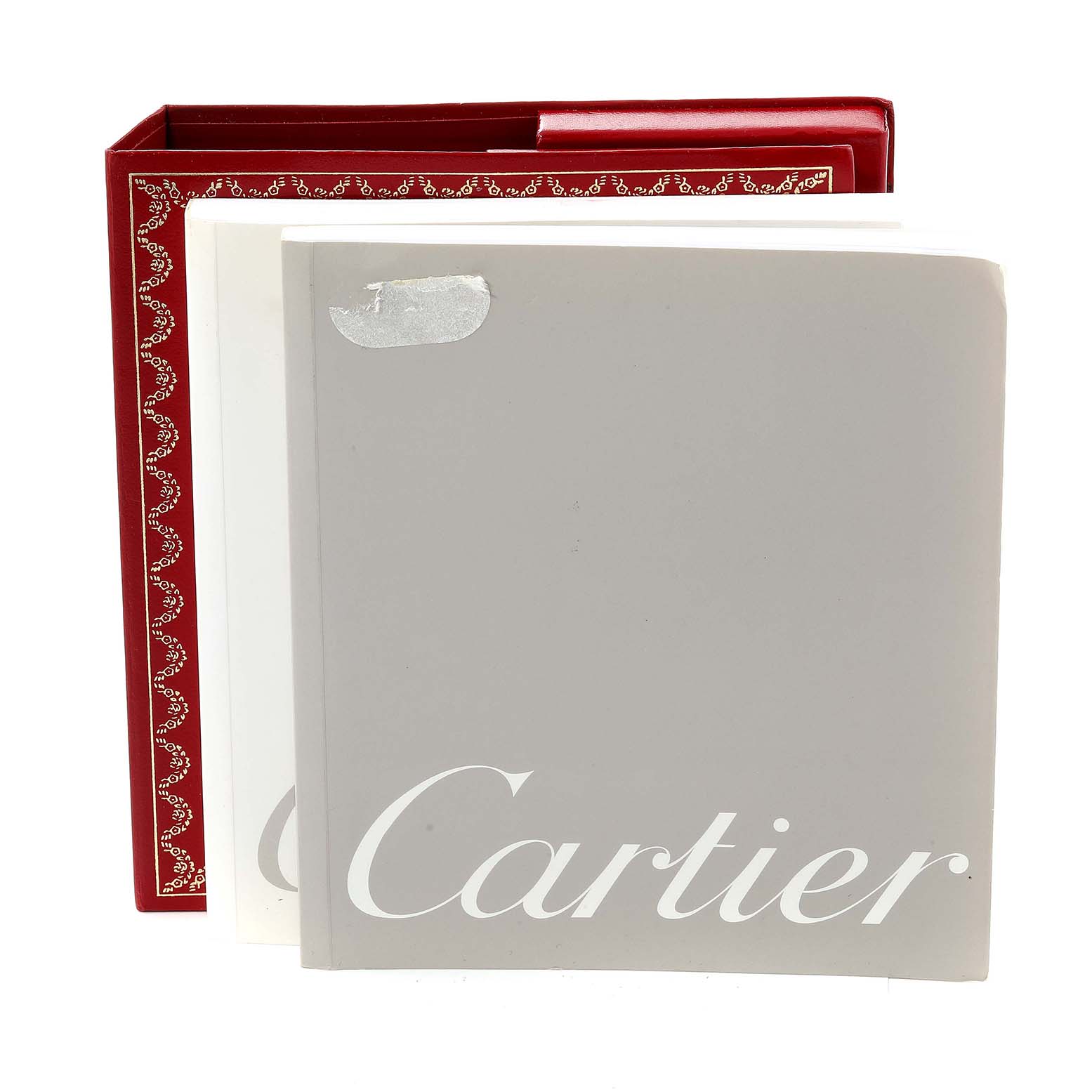 The image shows the manuals or booklets and a red box for the Cartier Pasha W31044M7 Men's Stainless Steel White Dial W31044M7 Men's Stainless Steel White Dial watch, taken from a front angle.