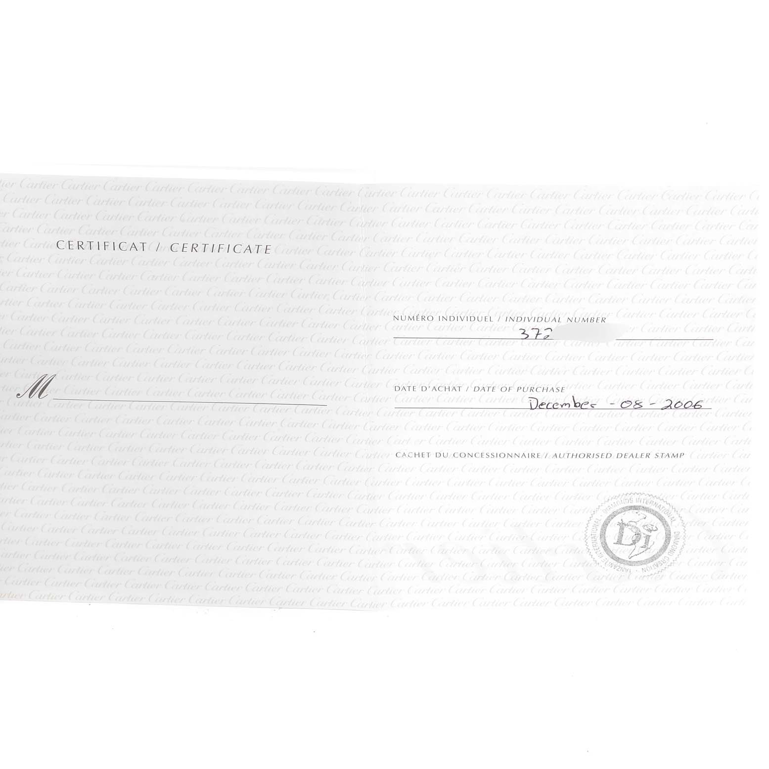 This image shows the certificate of authenticity for a Cartier Roadster W62005V1 Men's Yellow Gold Silver Dial W62005V1 Men's Yellow Gold Silver Dial watch, featuring the purchase date, individual number, and dealer stamp.