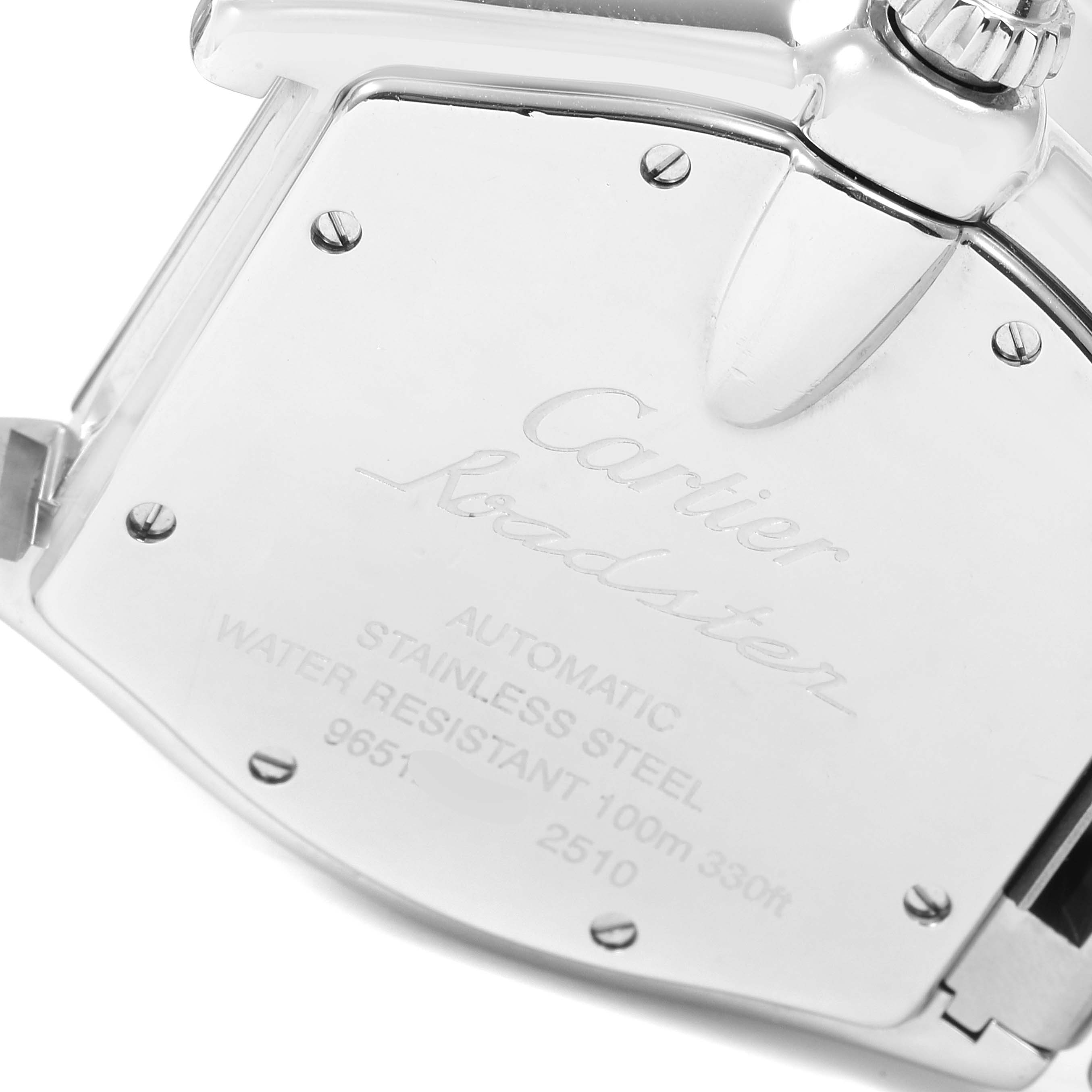 The image shows the back case and crown of a Cartier Roadster W62025V3 Men
s Stainless Steel Silver Dial W62025V3 Men
s Stainless Steel Silver Dial watch, featuring its inscriptions and screws.