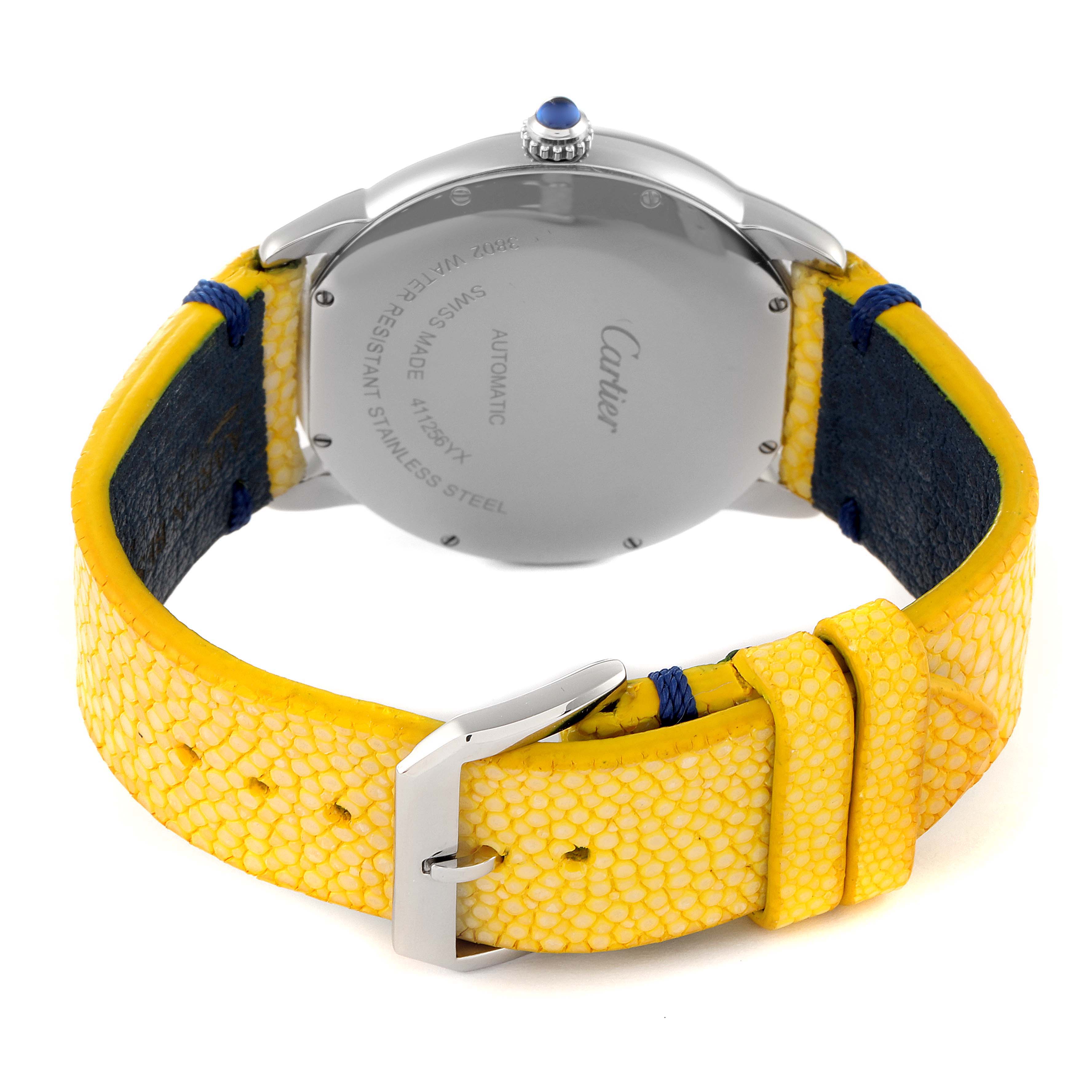 The image shows the back of a Cartier Tank Solo WSRN0023 Men's Stainless Steel Blue Dial WSRN0023 Men's Stainless Steel Blue Dial watch, featuring the case back, crown, and yellow leather strap.